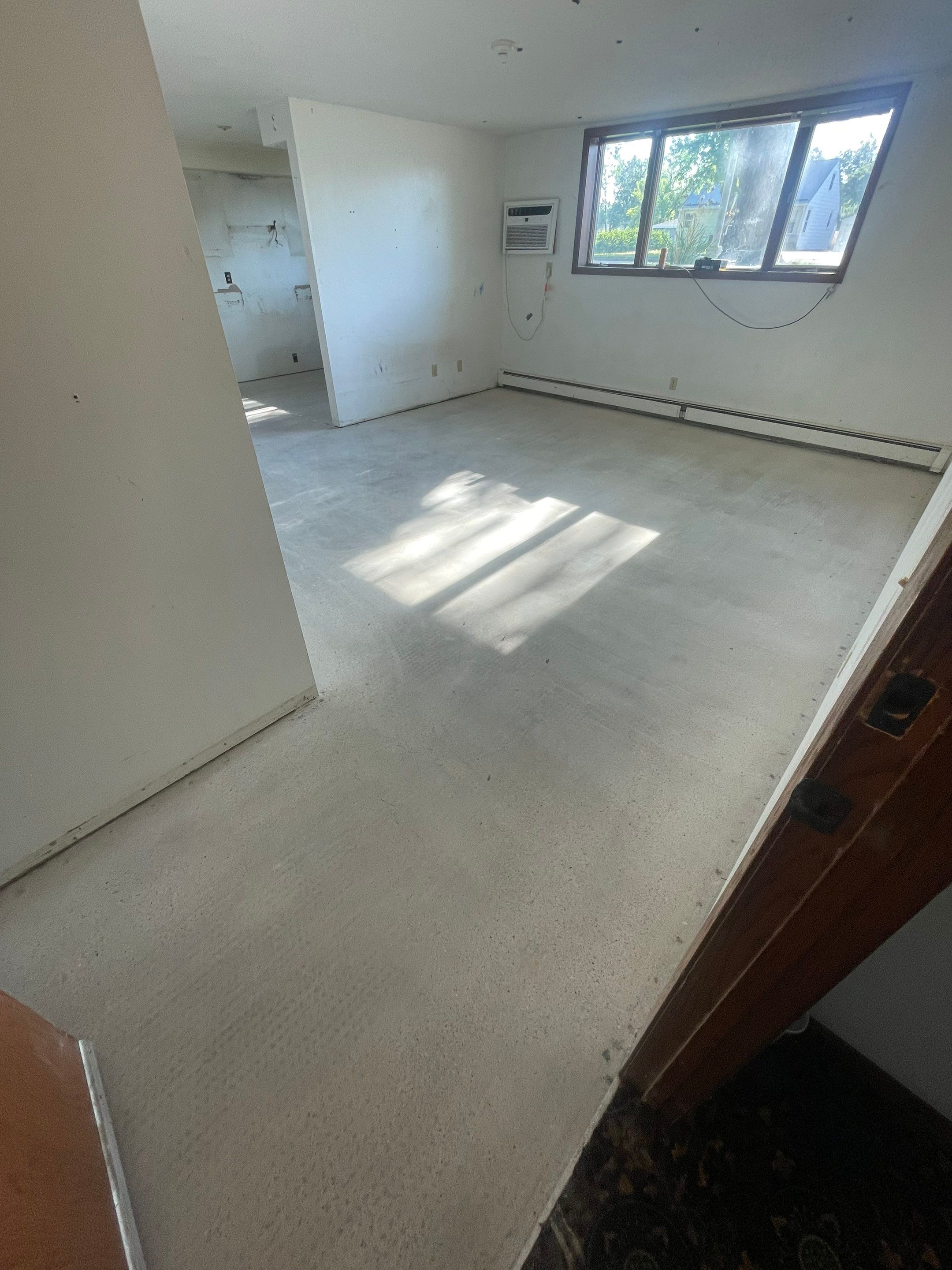 Commercial Subfloor Preparation and Flooring Restoration in Sioux Falls by Select Painting, Coatings & Garage Cabinets