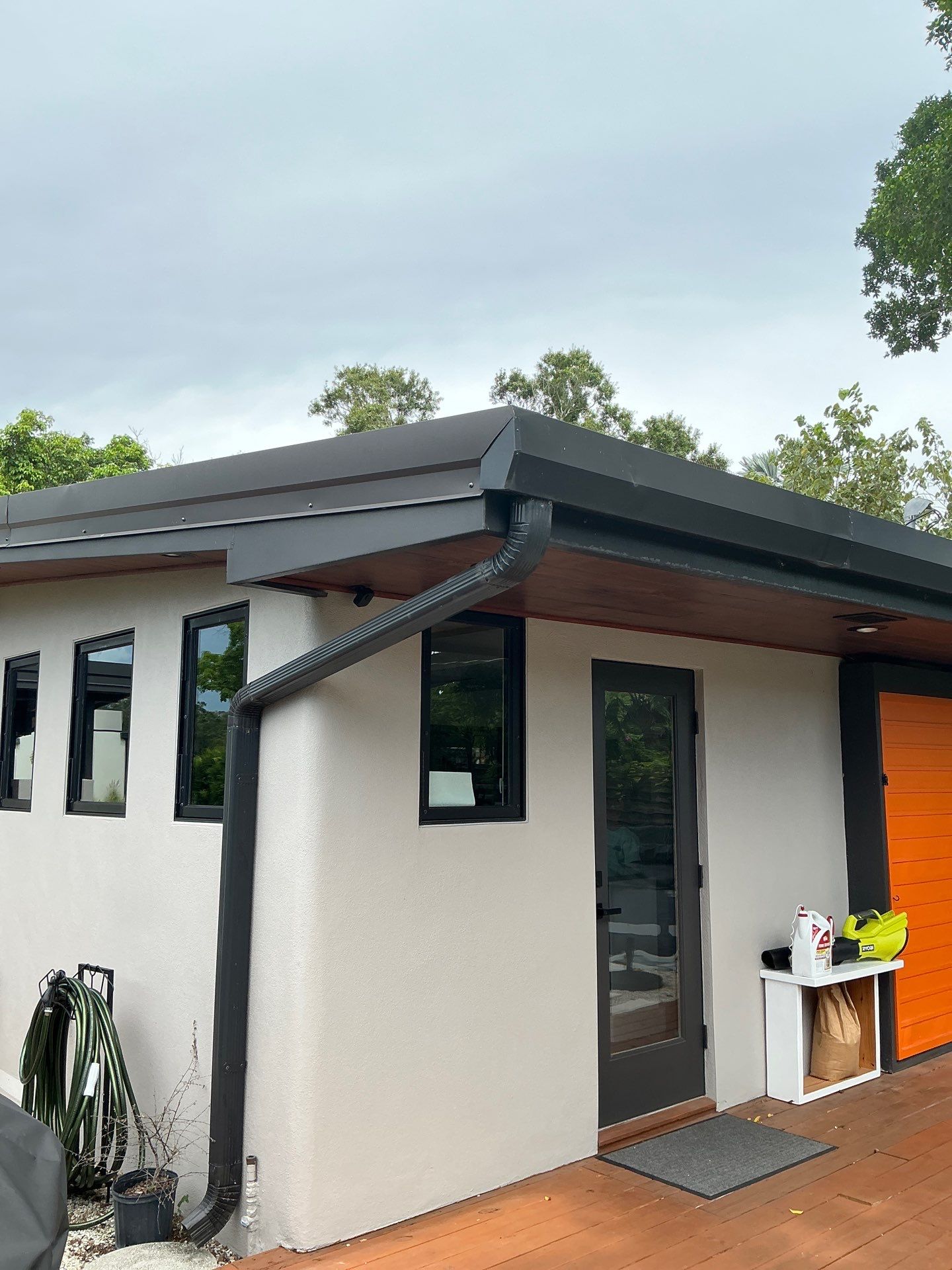 Black Seamless Gutters in Sarasota FL by Gutter Professors