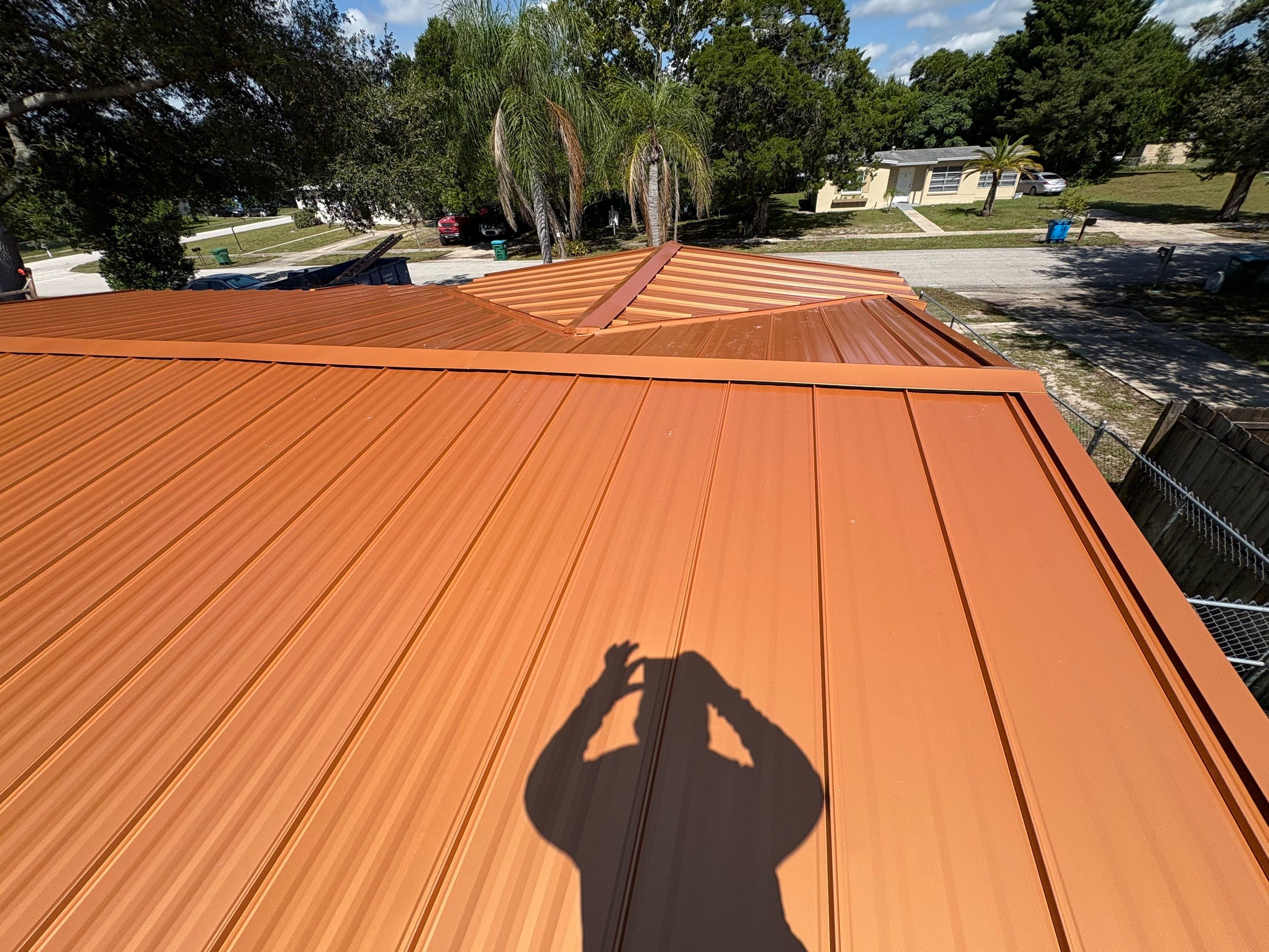 Standing Seam Metallic Copper Metal Roof Replacement in Deltona by Pinnacle Roofing Group