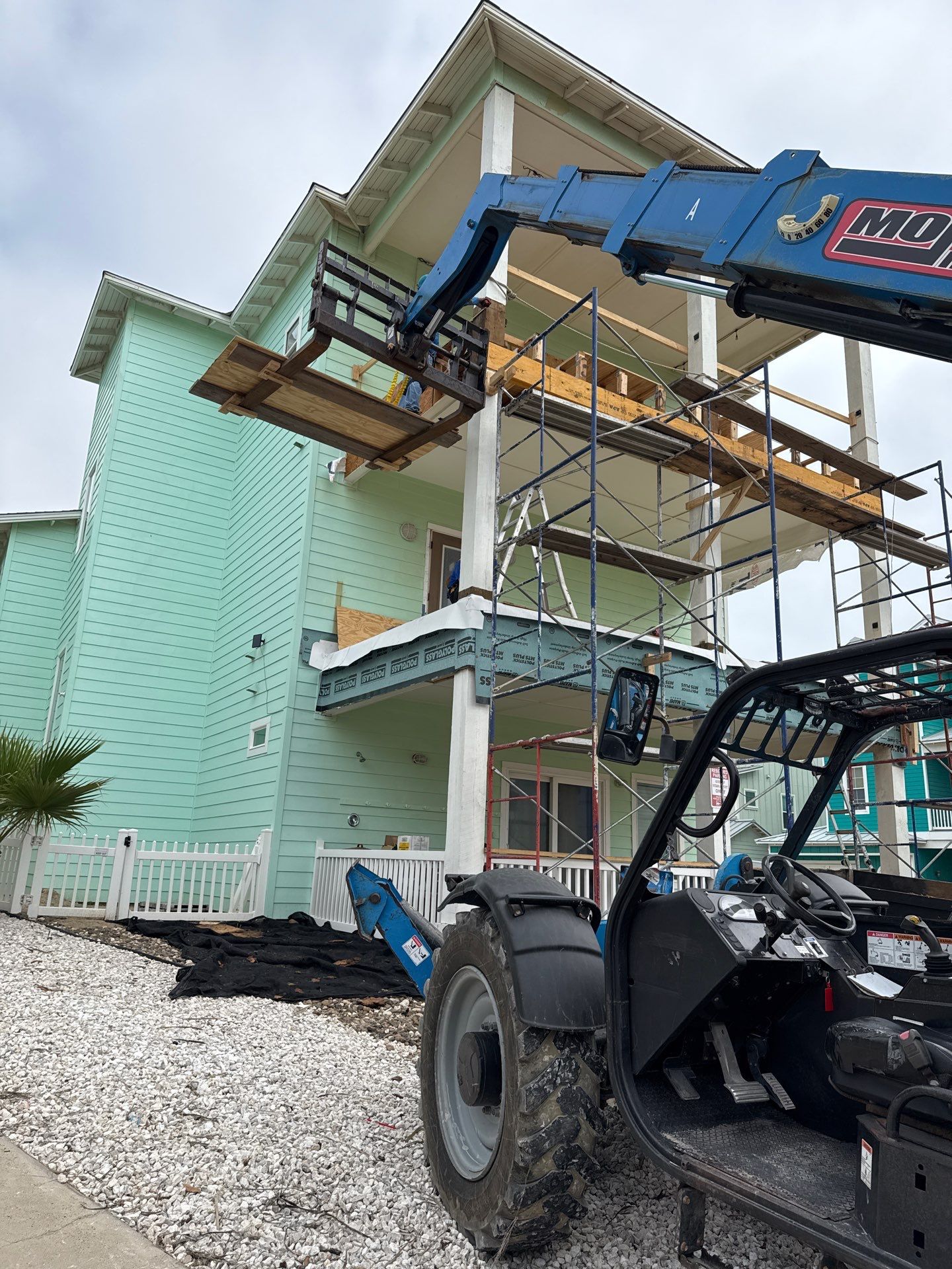 Walk Out Patio Cover by Bayfront Roofing and Construction