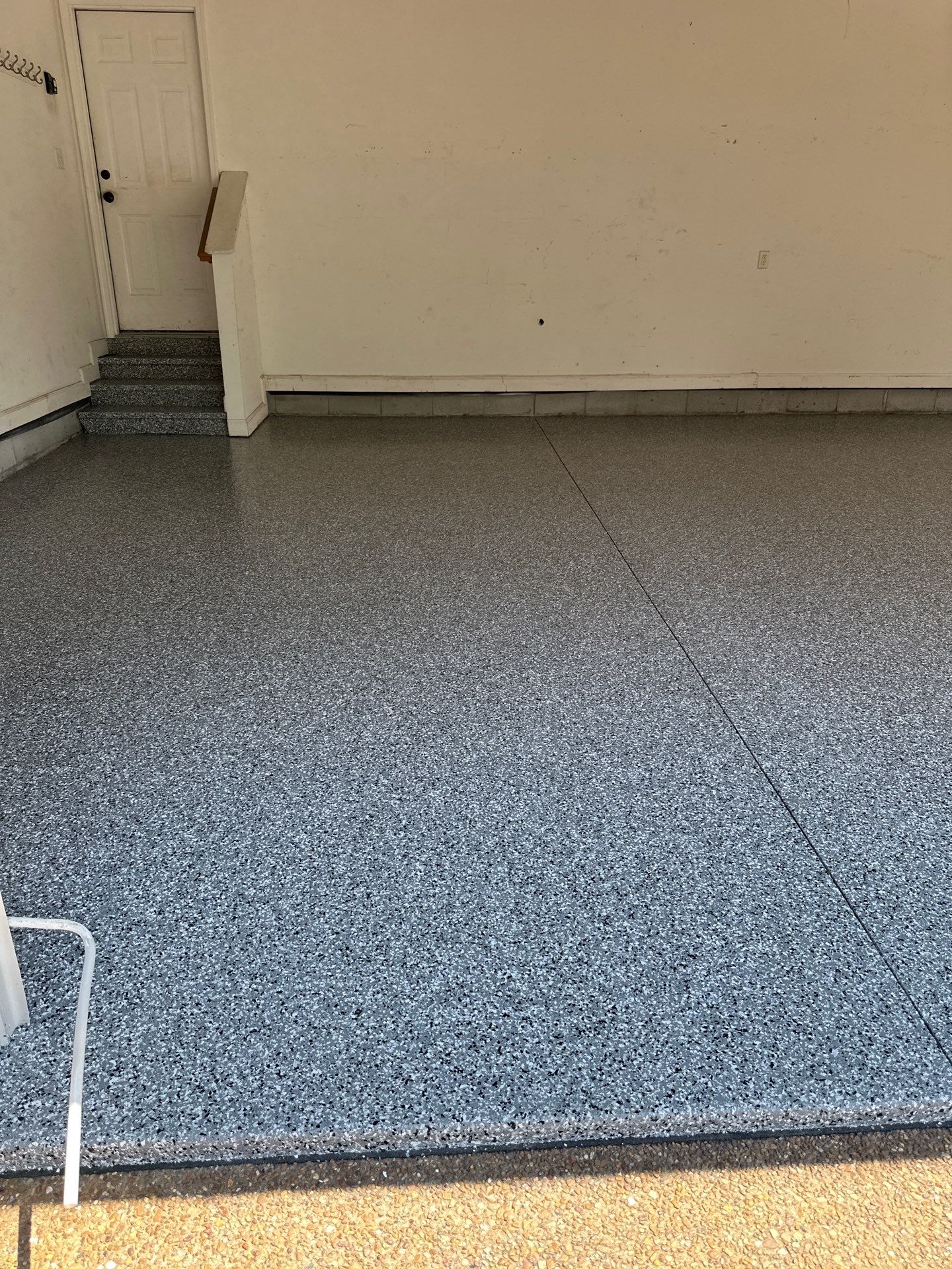 Garage Floor Coating using Wombat by My Garage Floor Guys