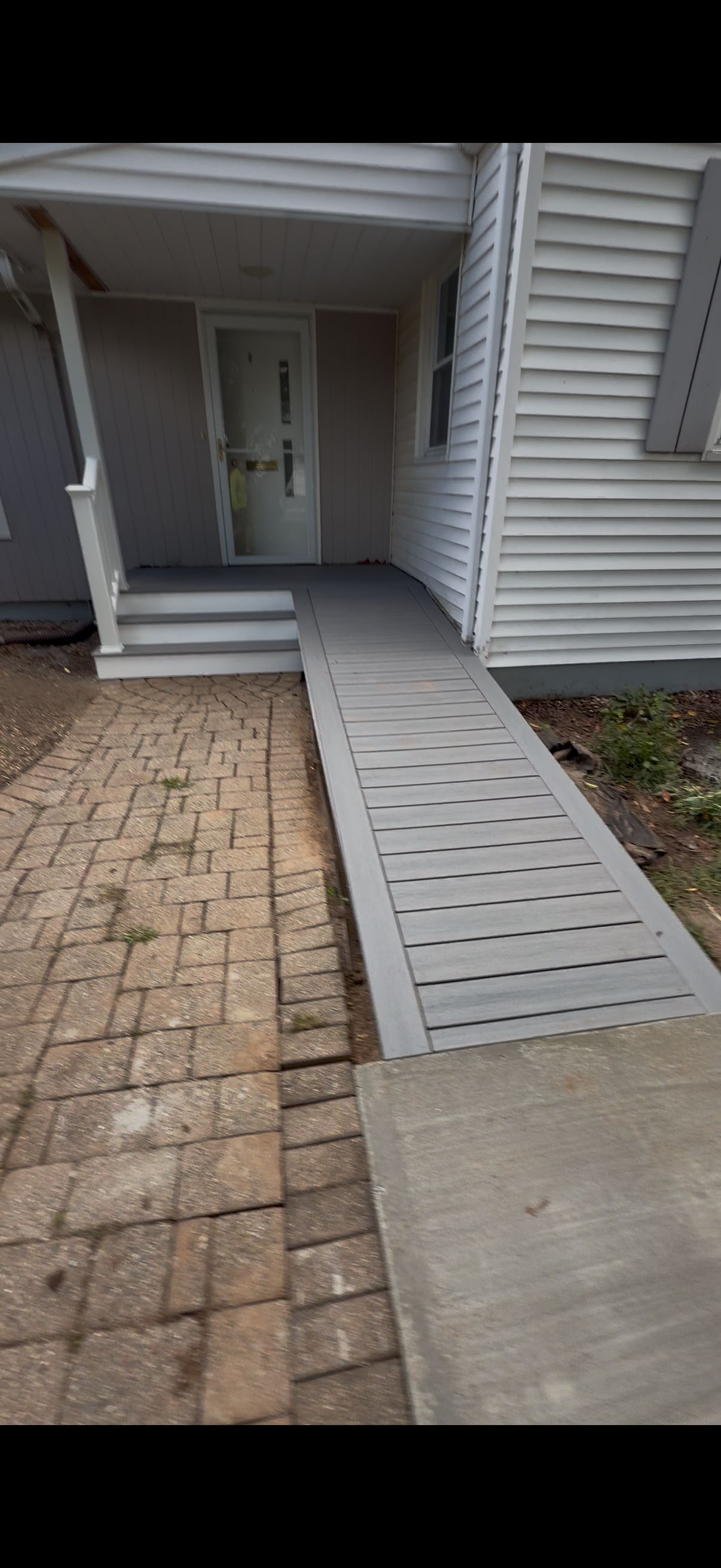 Deck and Ramp replacement using Trex Select Millstone, Trex transcend White Railings  by DiGiorgi Roofing and Siding Inc