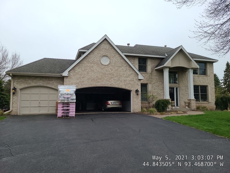 Eden Prairie, MN – Roof Replacement on Steep and High Roof by First Impressions Exteriors