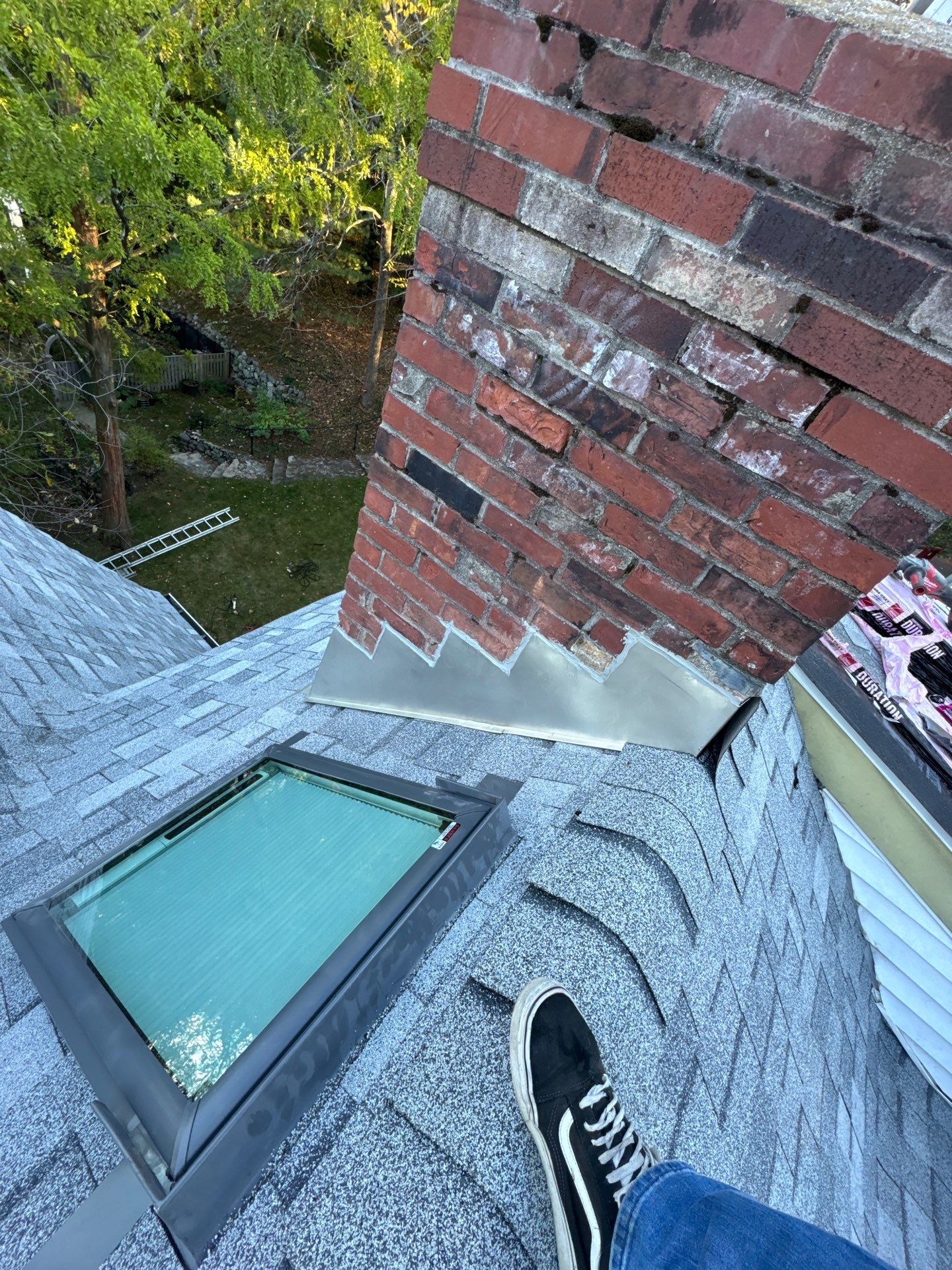 Full Roof & Porch EPDM Replacement with Skylight and Chimney Repairs by Mighty Dog Roofing of Greater Middlesex County