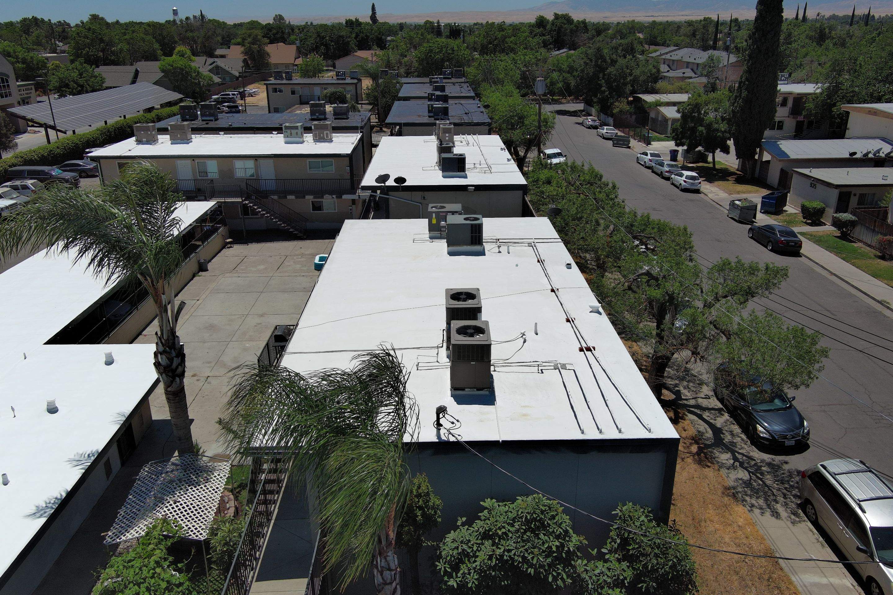 Foam Refurbish using General Coatings acrylic coatings and spray foam by Straight Edge Roofing Inc