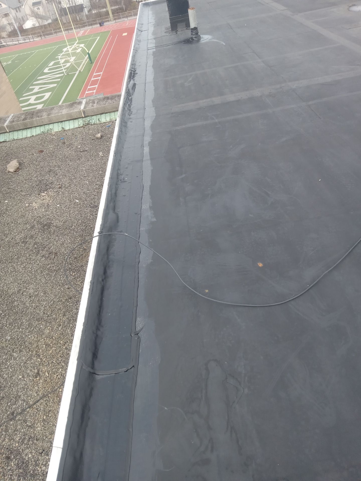 Commercial Roofing using Roof Replacement by Absolute Roofing and Construction