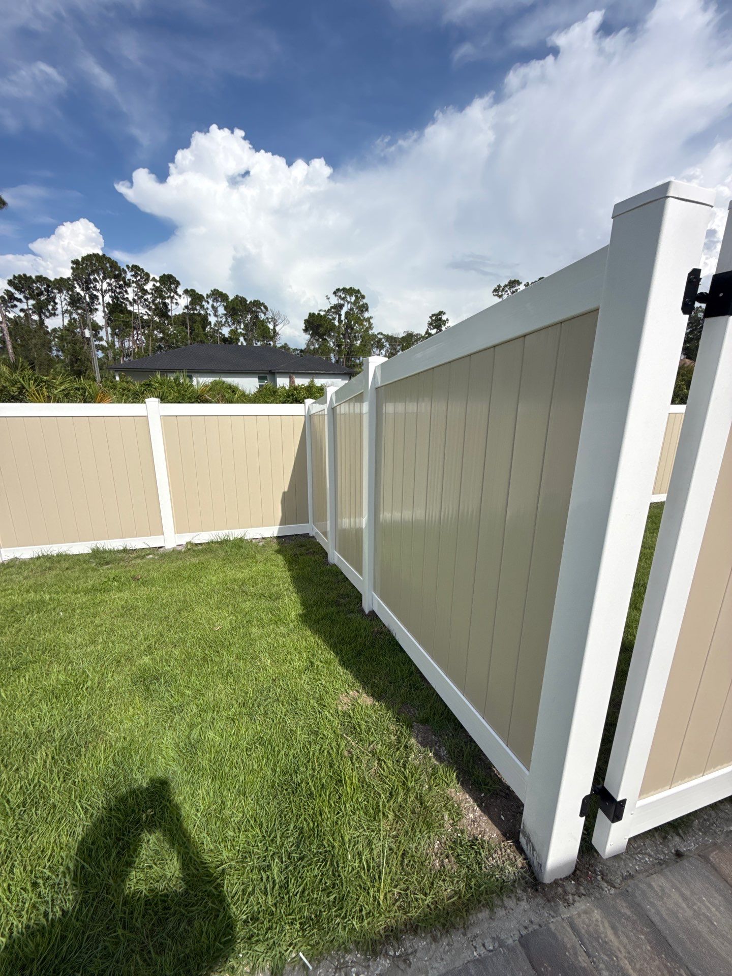Custom Two-Tone Vinyl Privacy Fence Installation in North Port by True Fence LLC
