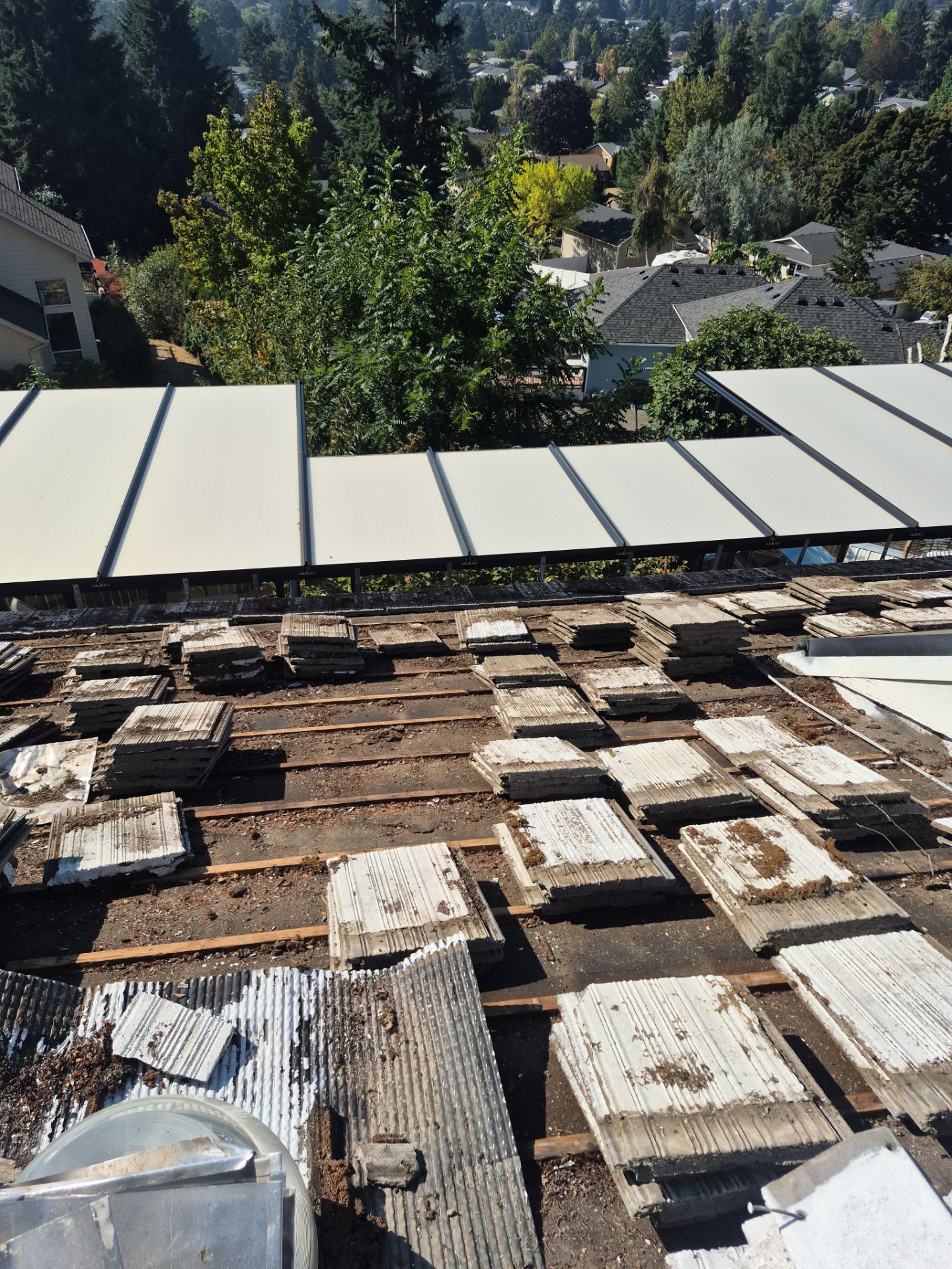 Granite Black Residential Roof Replacement by Orezona Building & Roofing Company, Inc.