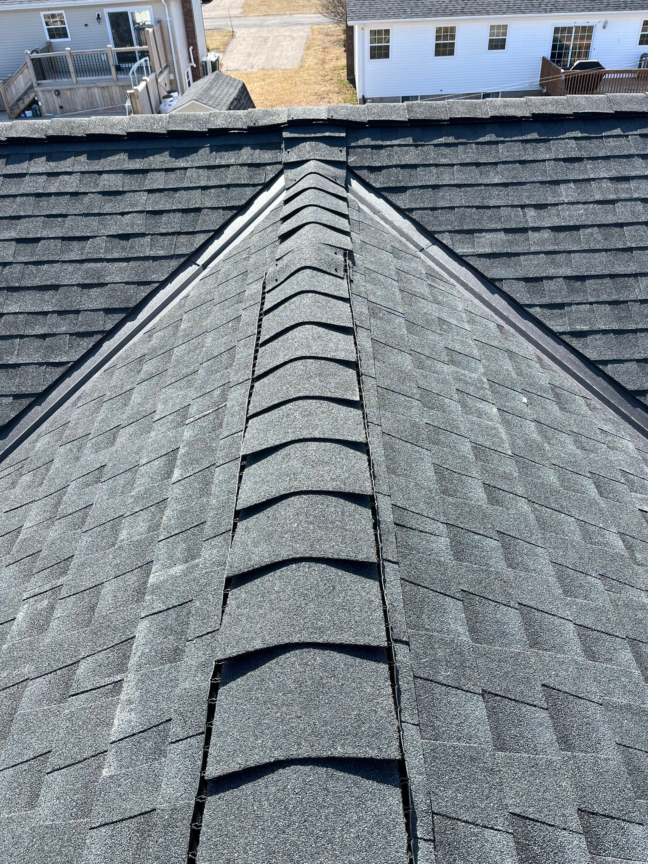 Residential Roofing Installation using Asphalt GAF HDZ in Charcoal by Artisan Roofing & Home Improvements Inc.