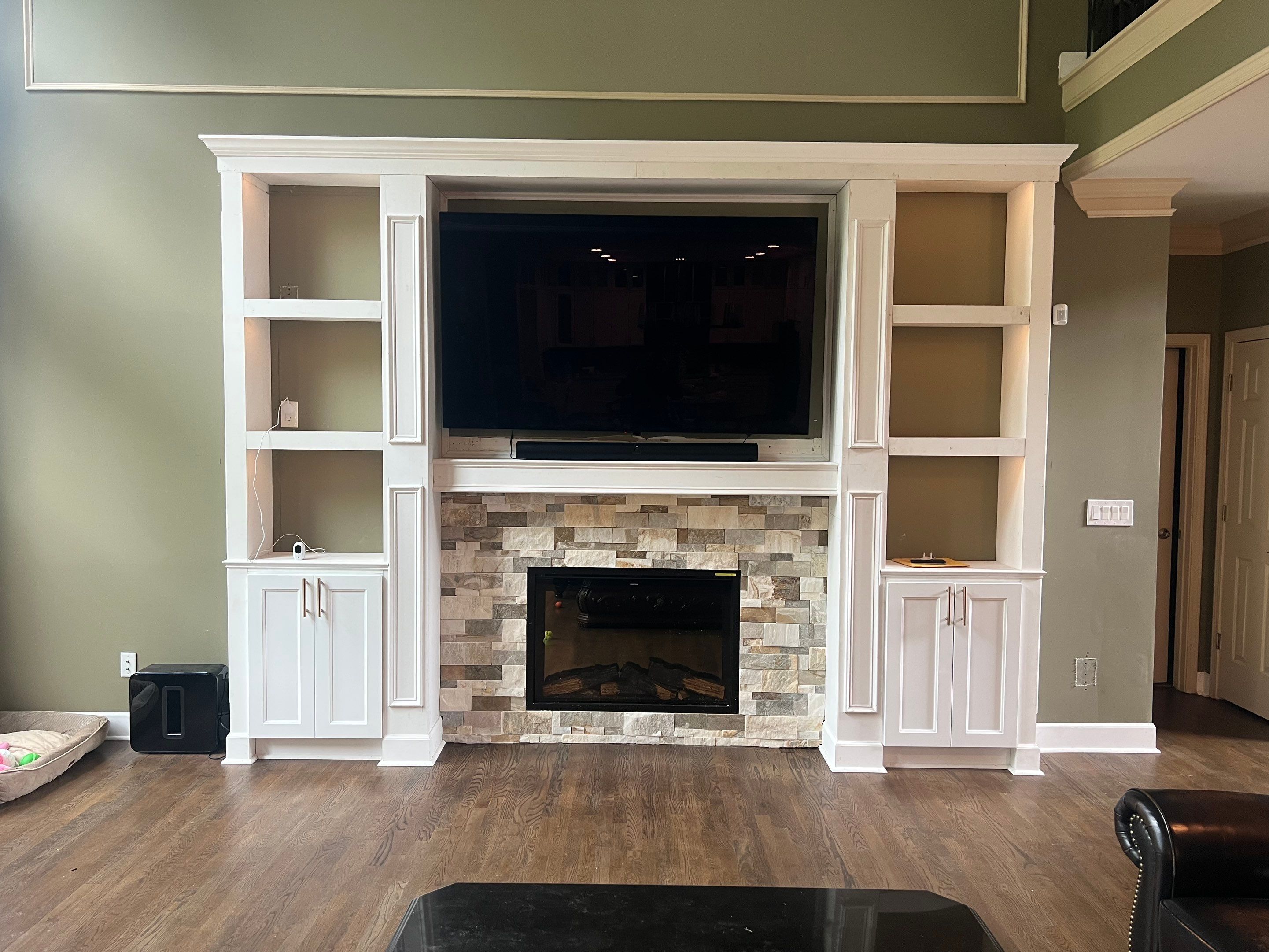 Custom Stone Fireplace and White Built-in Cabinetry in Suwanee by Swift Home Renovations