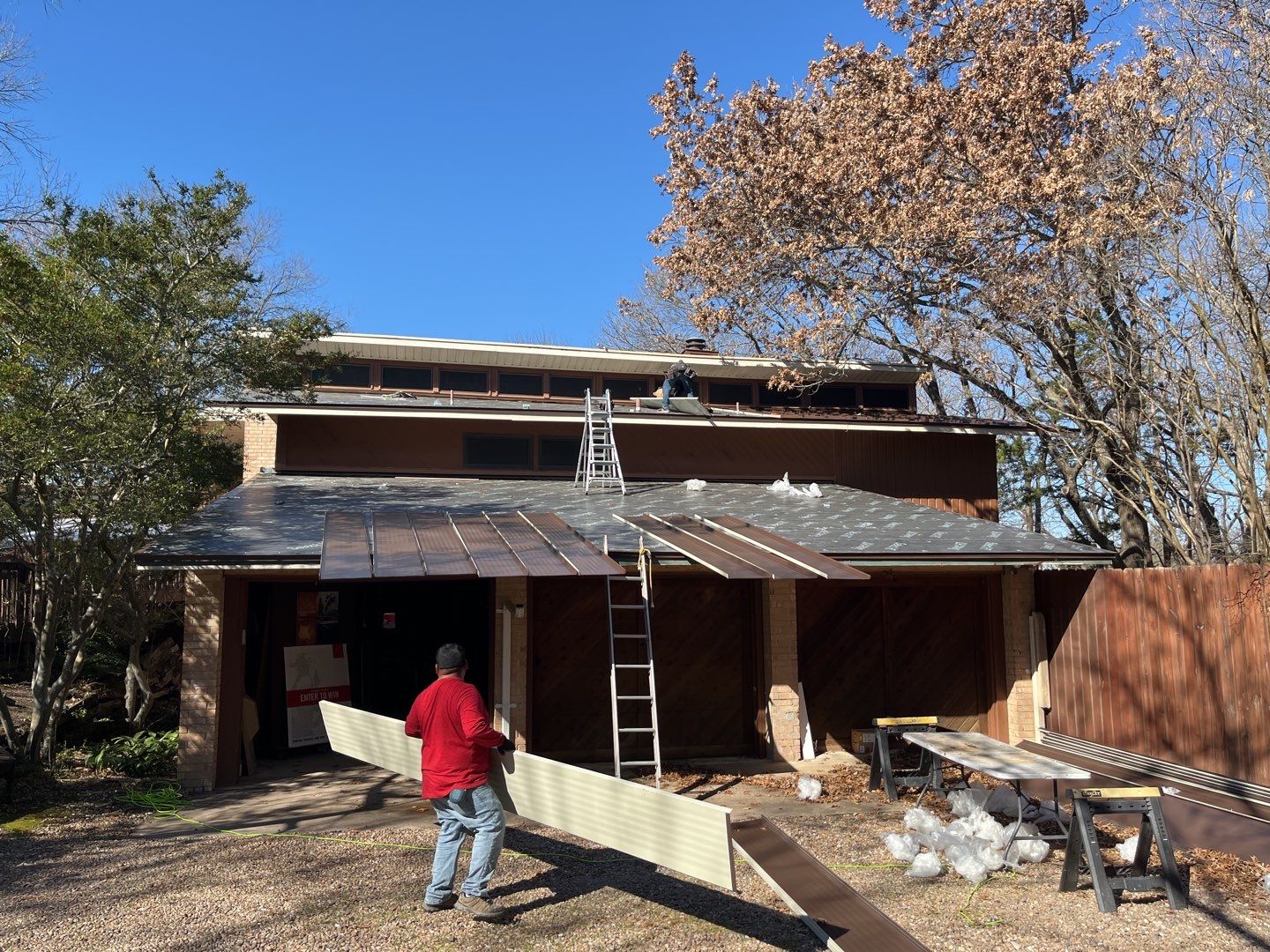 Residential Roofing Installation using Standing Seam Metal Roofing and Composition Shingles by Rainy Day Restoration