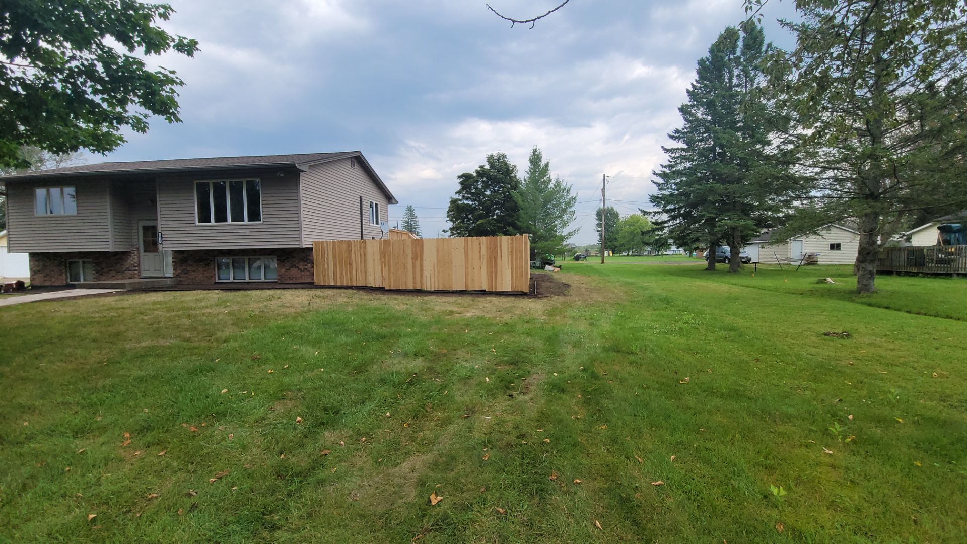 Multi-Level Cedar Deck by Anchor North Property Services