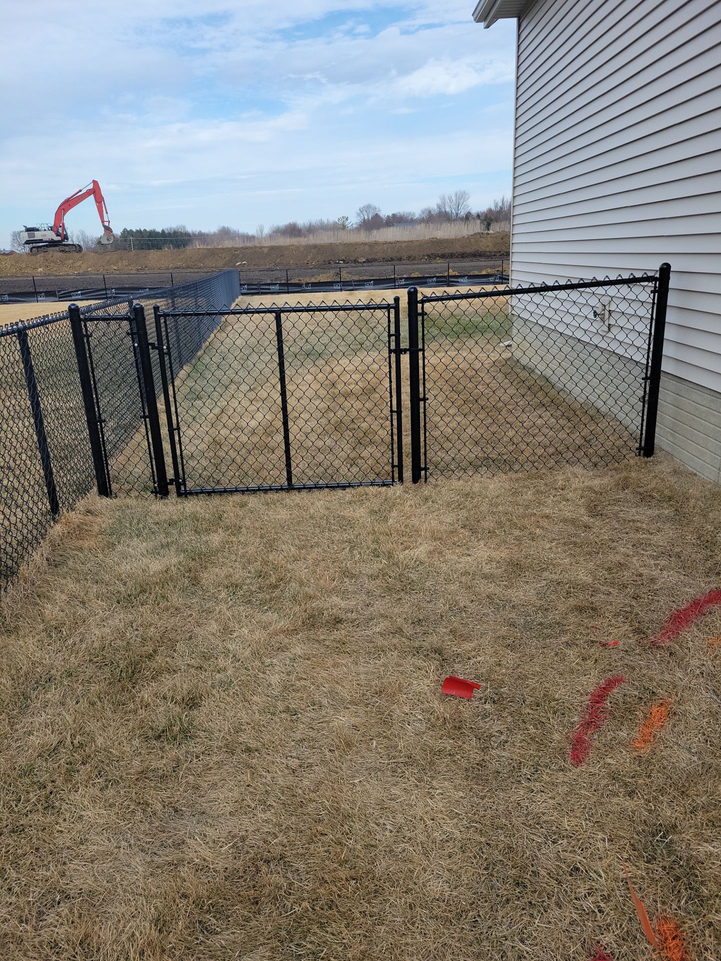 Black Chain Link Fence and Gate Installation in Cedar Falls by Perfect Picket Fence and Stain