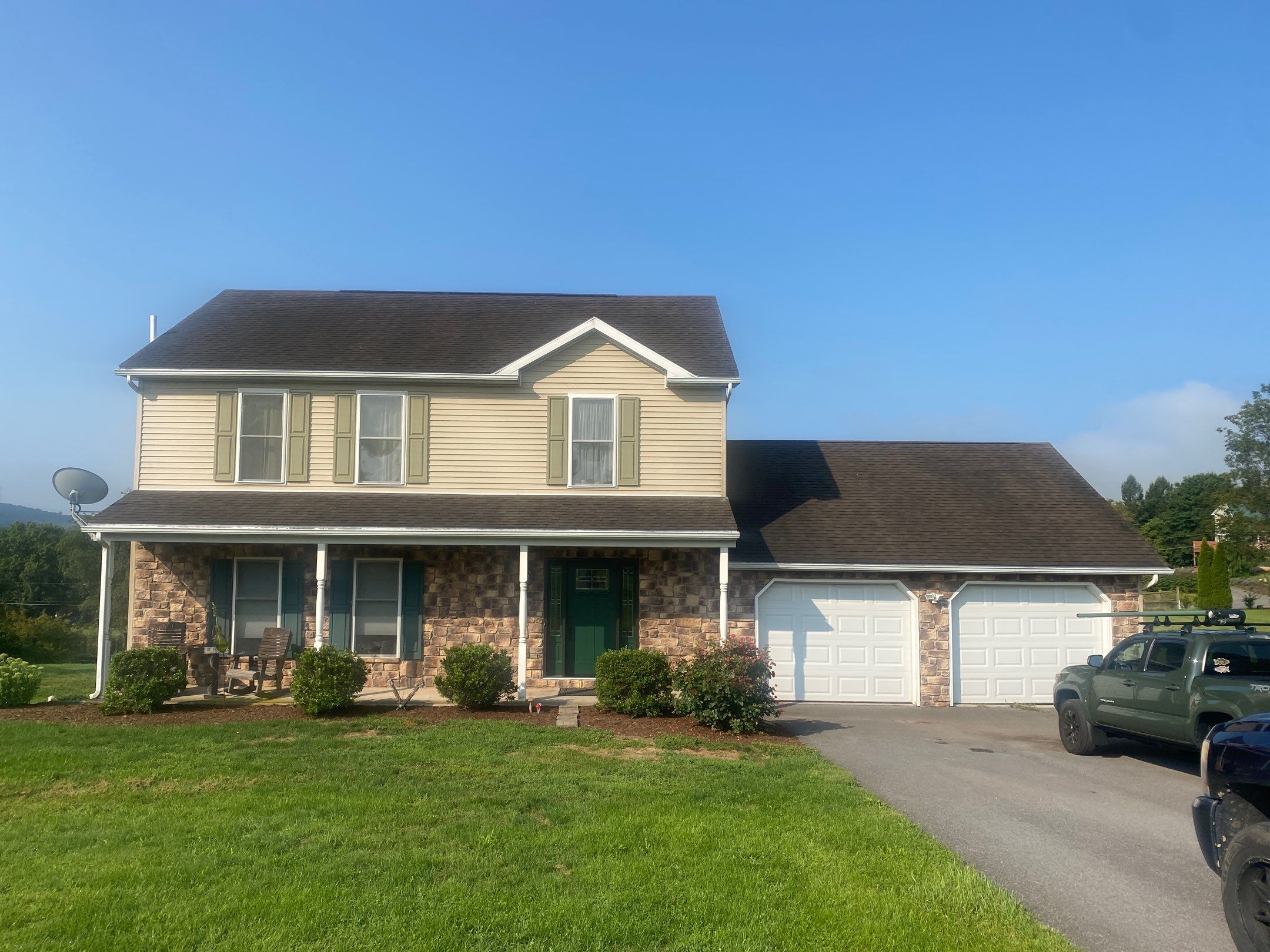 Reshingle and Entry Door by Esh Builders