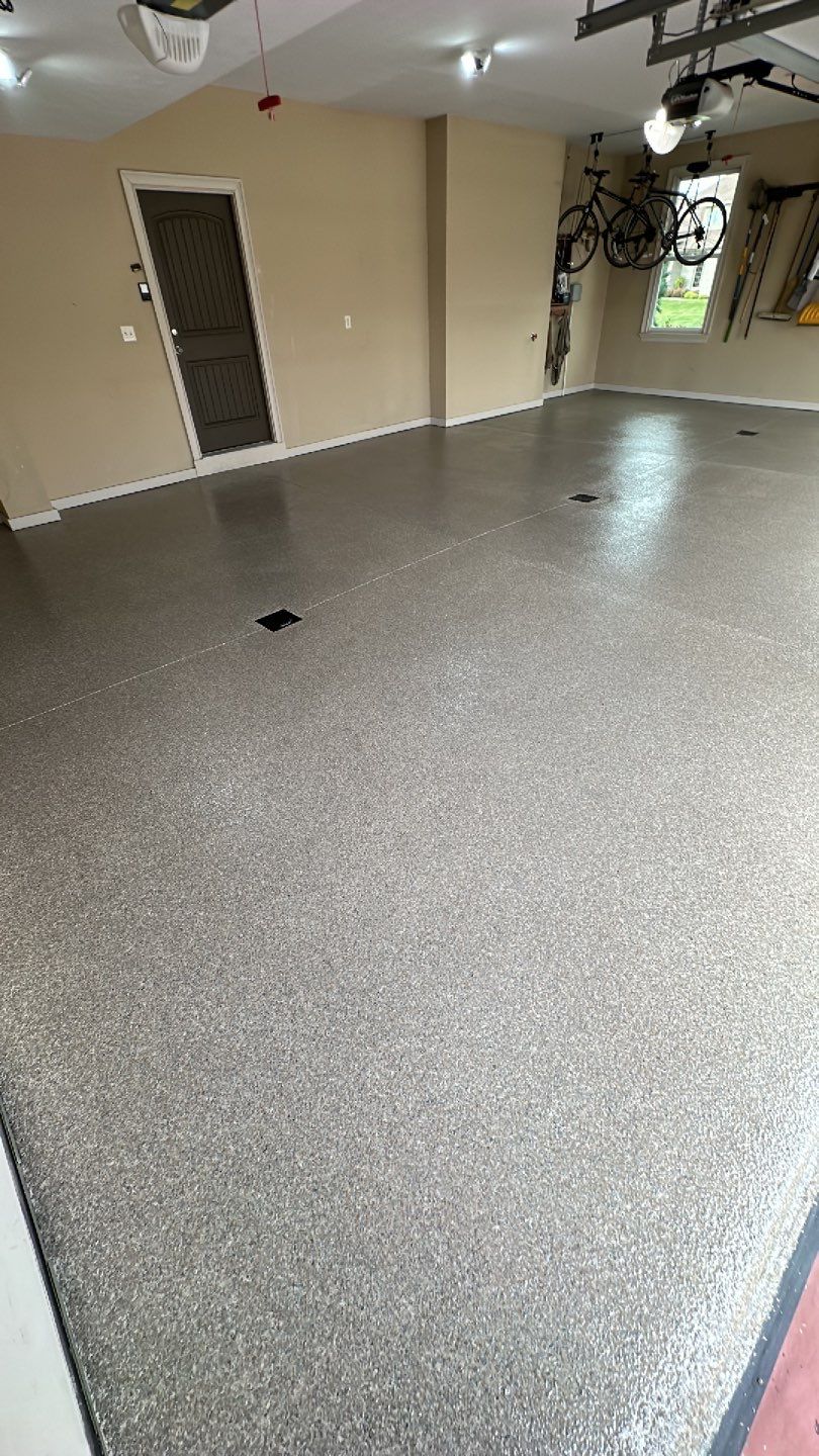 Large Patio + Garage Project in Moon Township by Floors in a Day, Inc