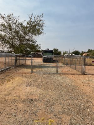 Gate installation using chain -link by Fence Guys Inc.
