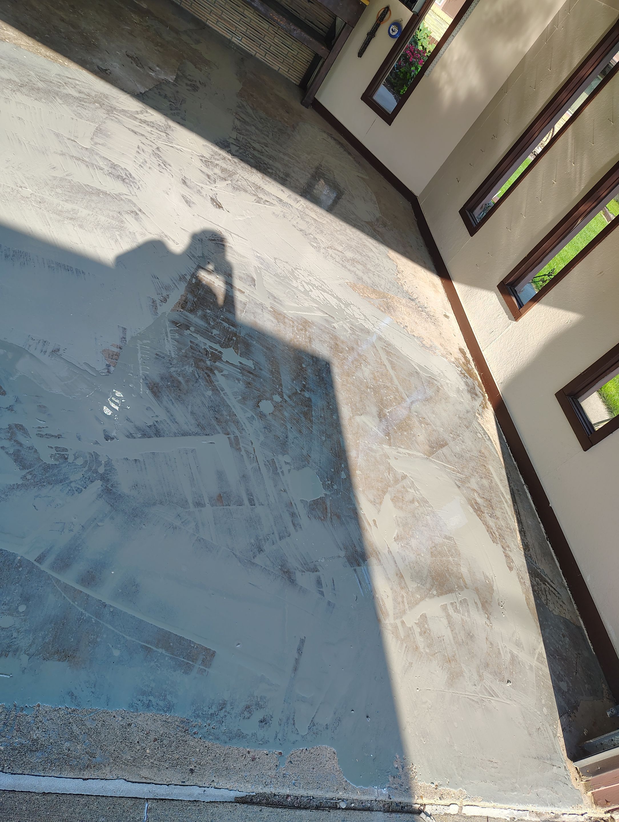 Garage Floor Coating with Crack Repair in Yankton by Select Painting, Coatings & Garage Cabinets