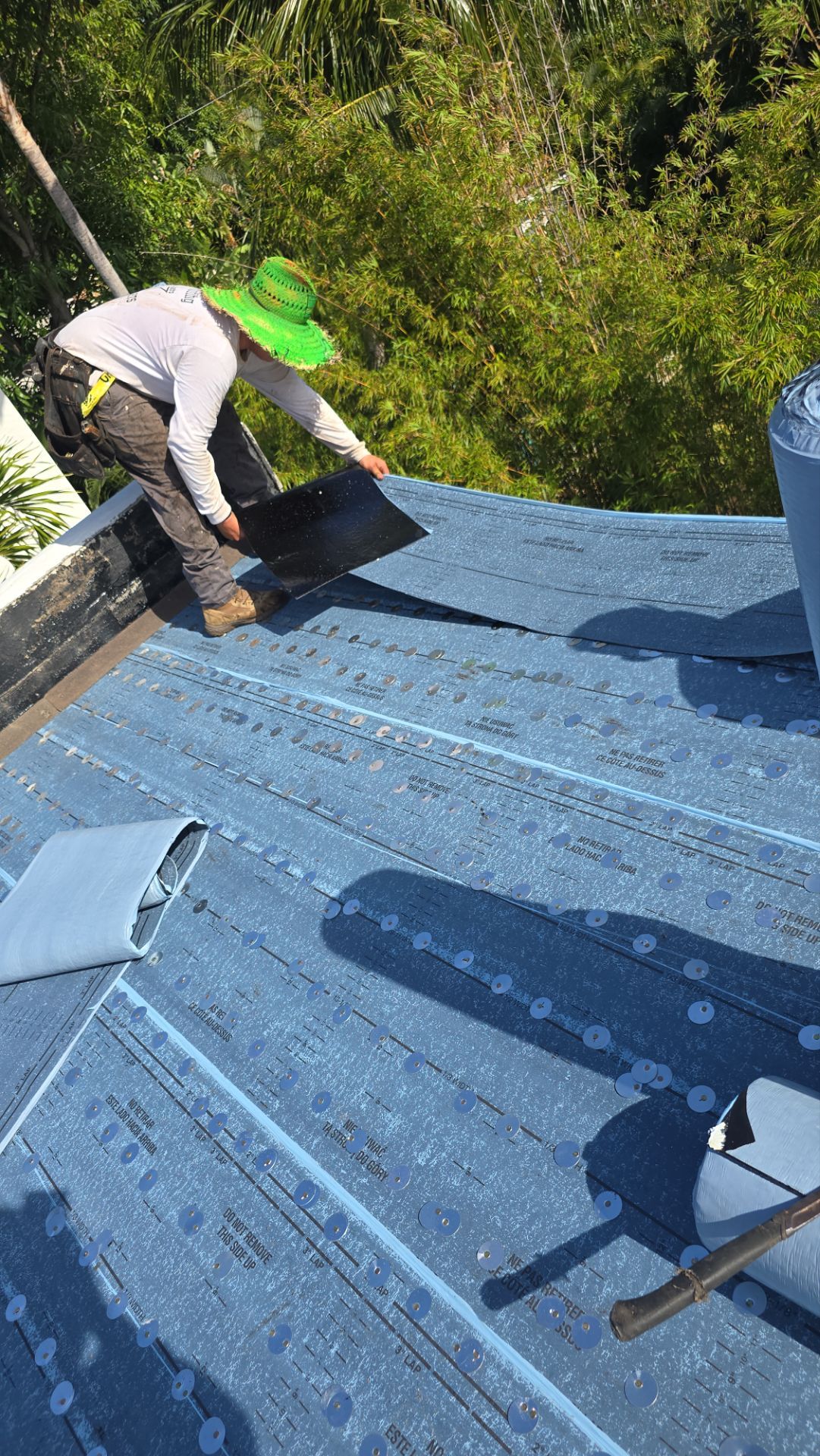 West Palm Beach Roof Restoration and Travertine Paver Driveway Installation by Aastro Roofing