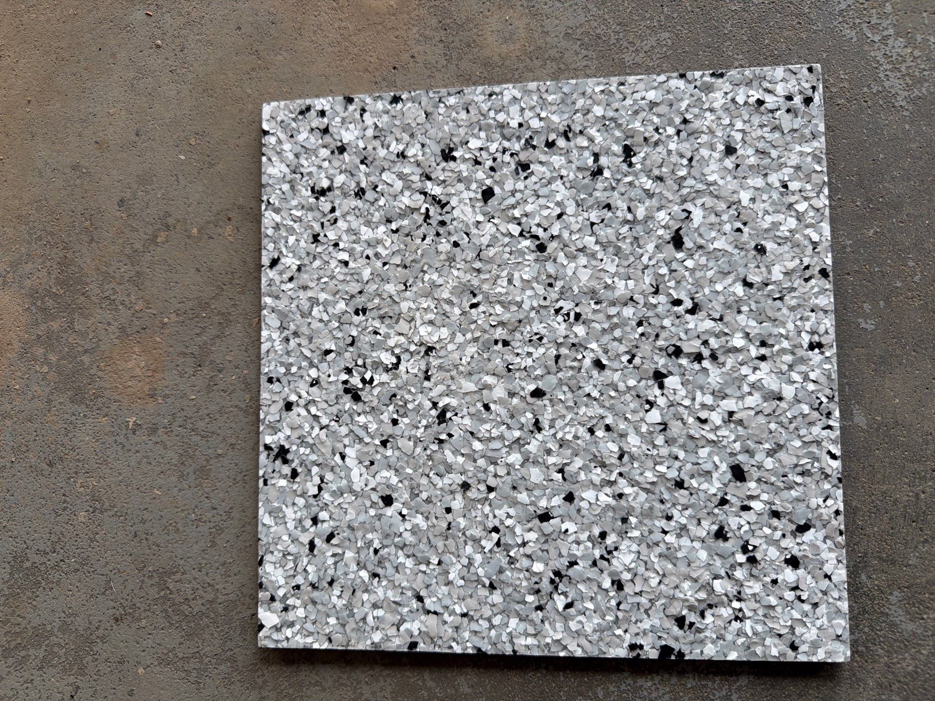 Feather Grey Garage Floor Coating Installation in Valley Springs by Select Painting, Coatings & Garage Cabinets