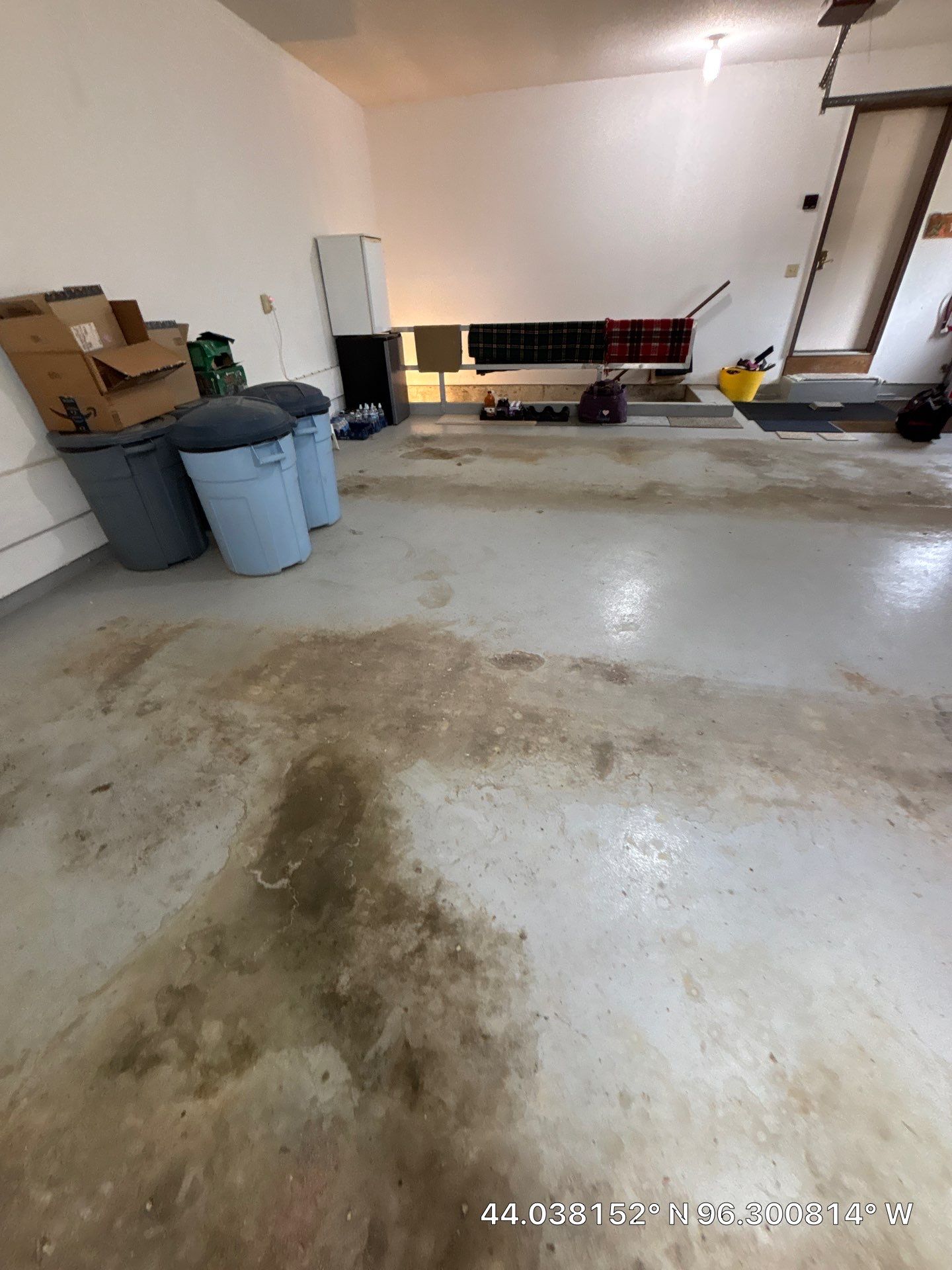 Custom Polyaspartic Garage Floor and Stairwell Coating in Pipestone by Select Painting, Coatings & Garage Cabinets