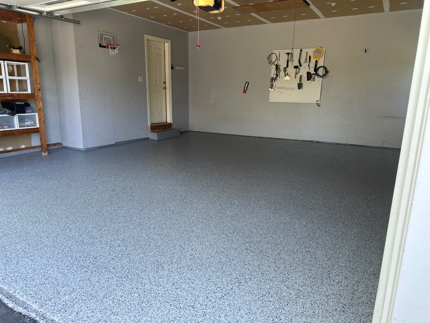Silverado garage floor coating  by NG Masonry & Construction LLC