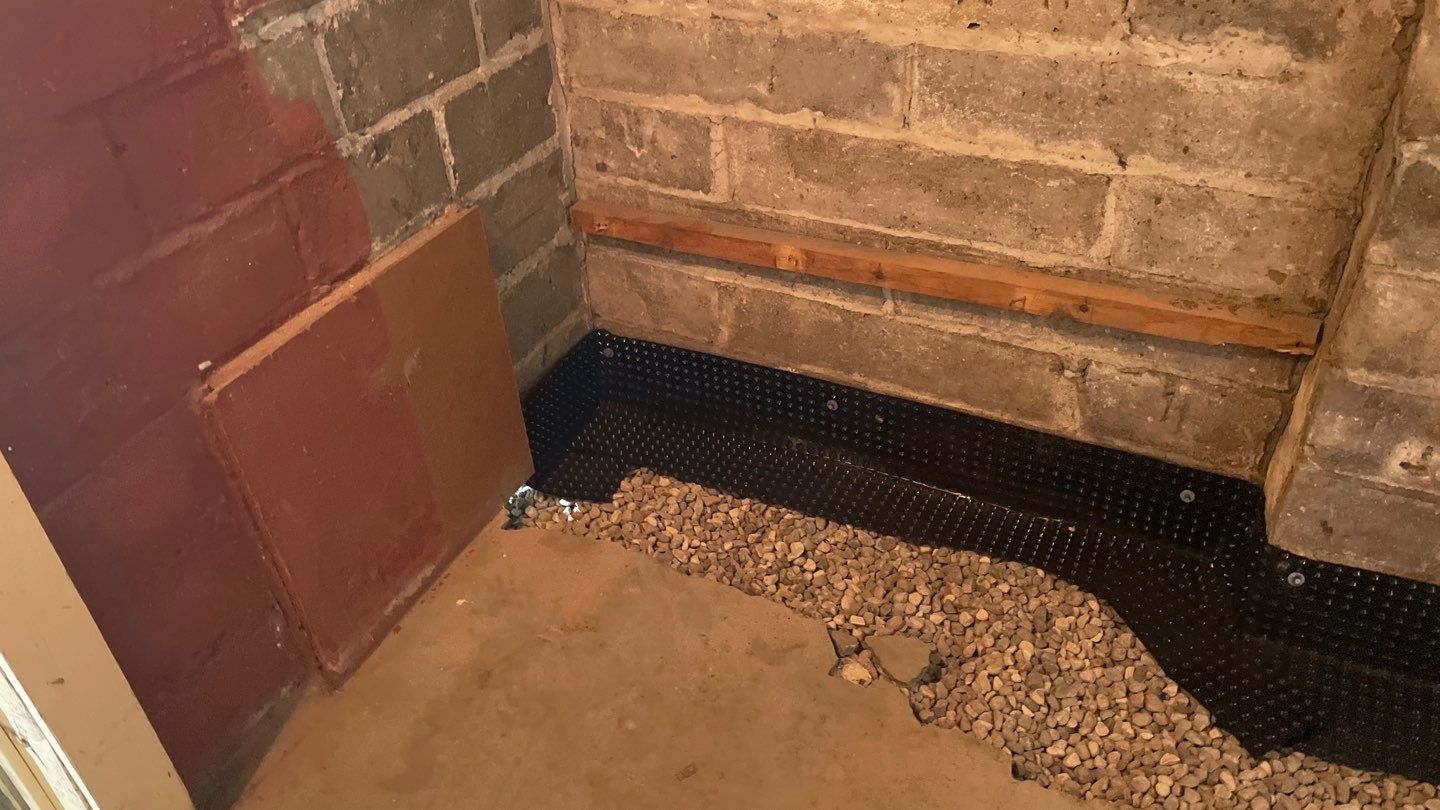 Interior Drain Tile for a South Minneapolis Basement by Waterproofing Northeast