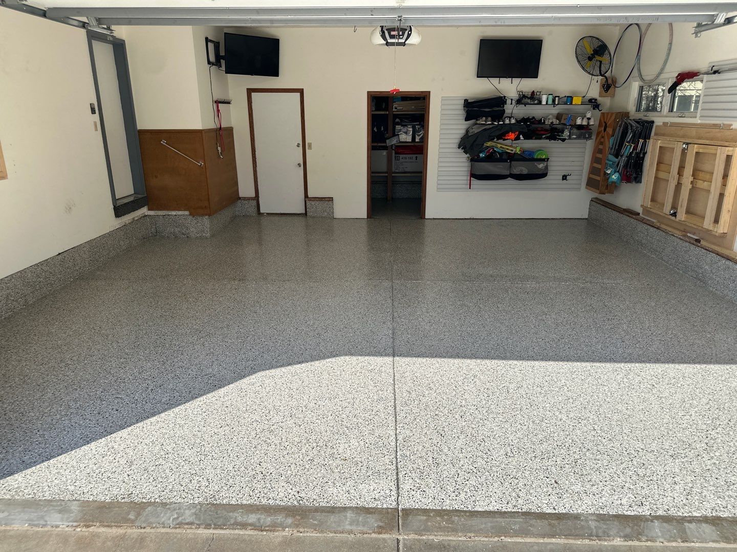 Two-Stall Epoxy Garage Floor Coating and Repair in Lincoln by Goat Coatings