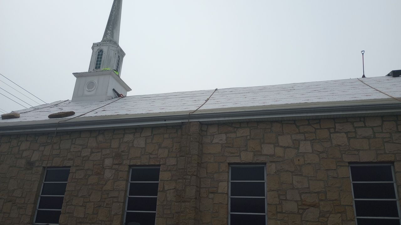 Commercial Roofing Installation using Performance Shingles by Mr. Roofer