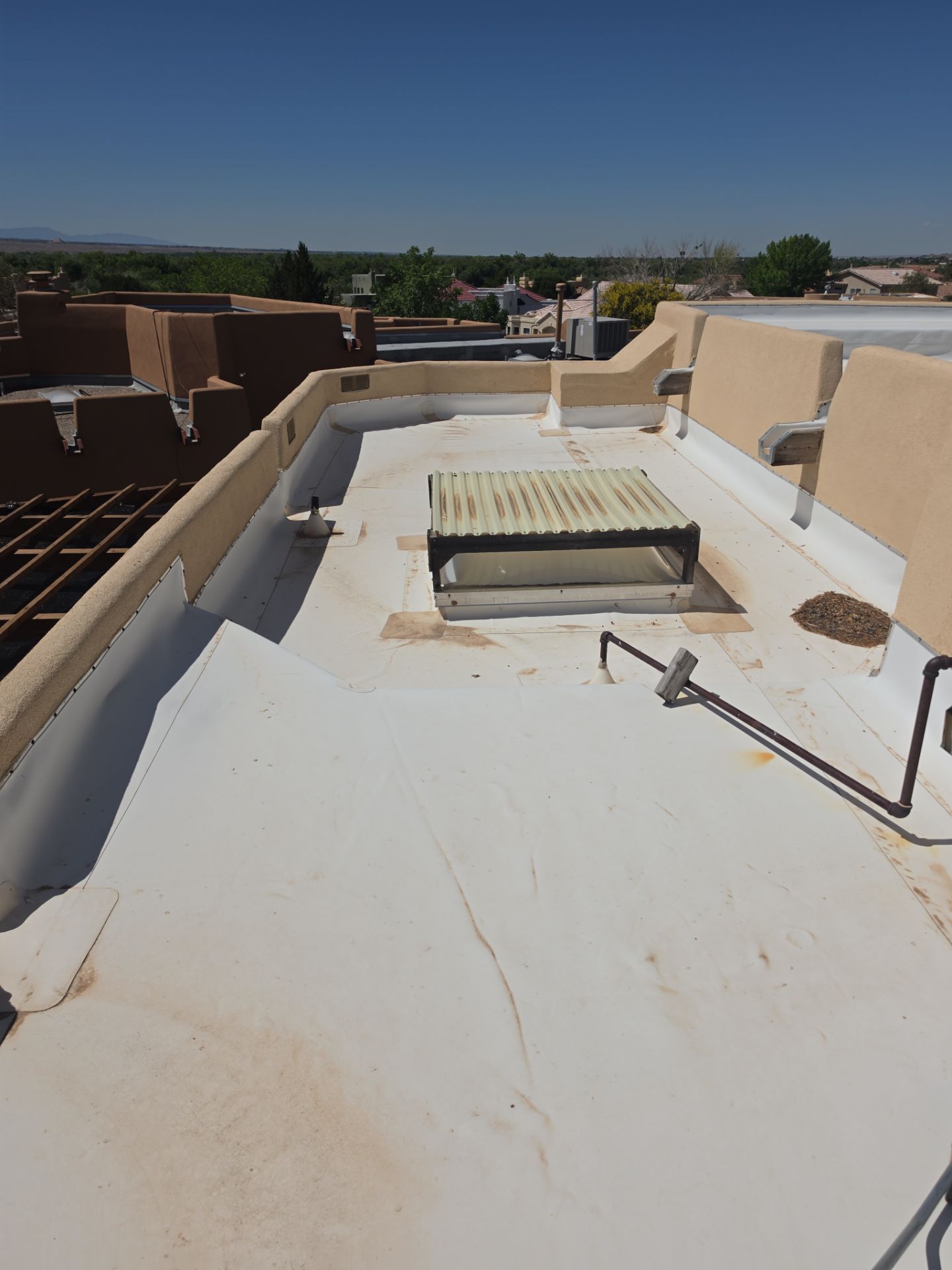 Low-e Glass Skylight Installation in Rio Rancho by Doyle Roof Masters Inc