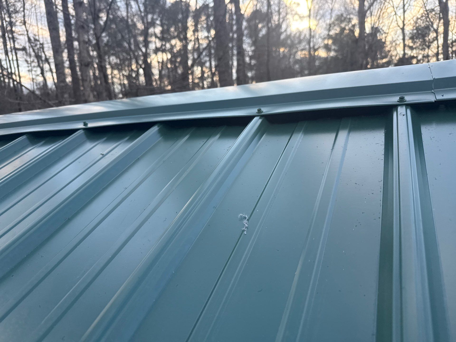 Metal Roof and Gutters Replacement in Hueytown by The Roofing Dudes