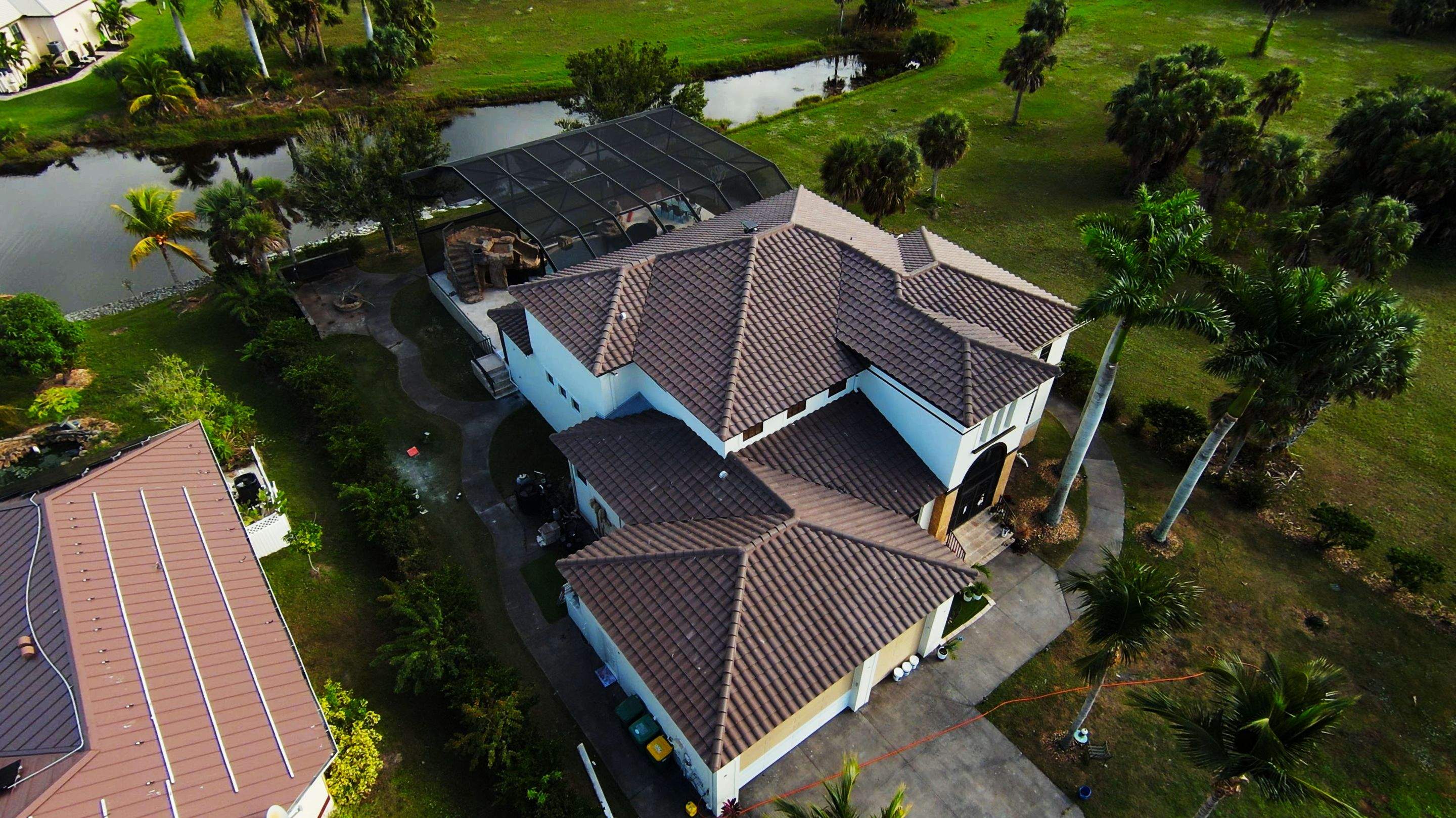 Punta Gorda Concrete Tile Roof Replacement by Four Peaks Roofing
