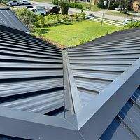 24ga 1.5" Mechanical Seam Matte Black  by Total Roofing System The Metal Roof Experts