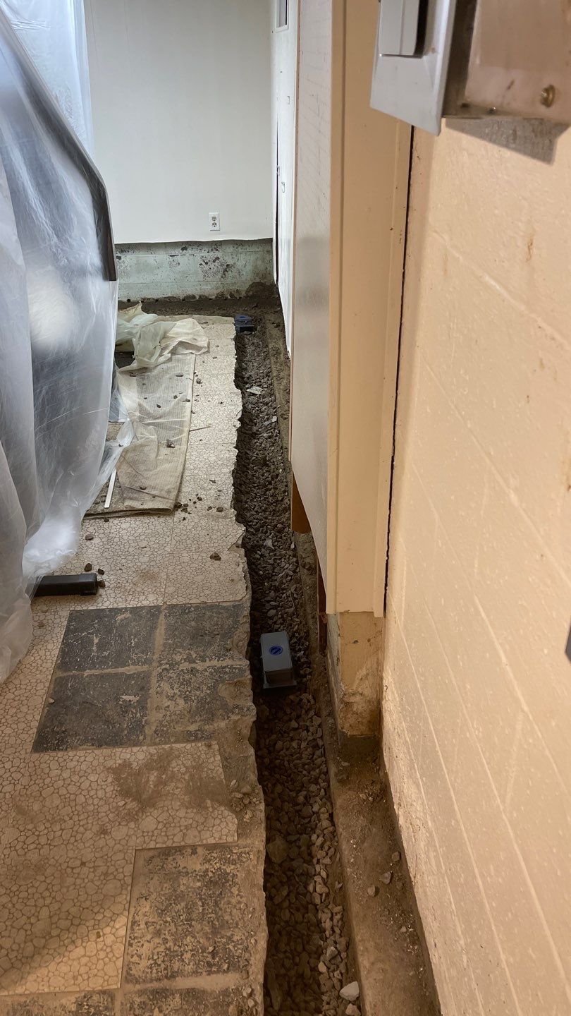 Interior Waterproofing Using GrateDrain™ Products by Toledo Basement Repair