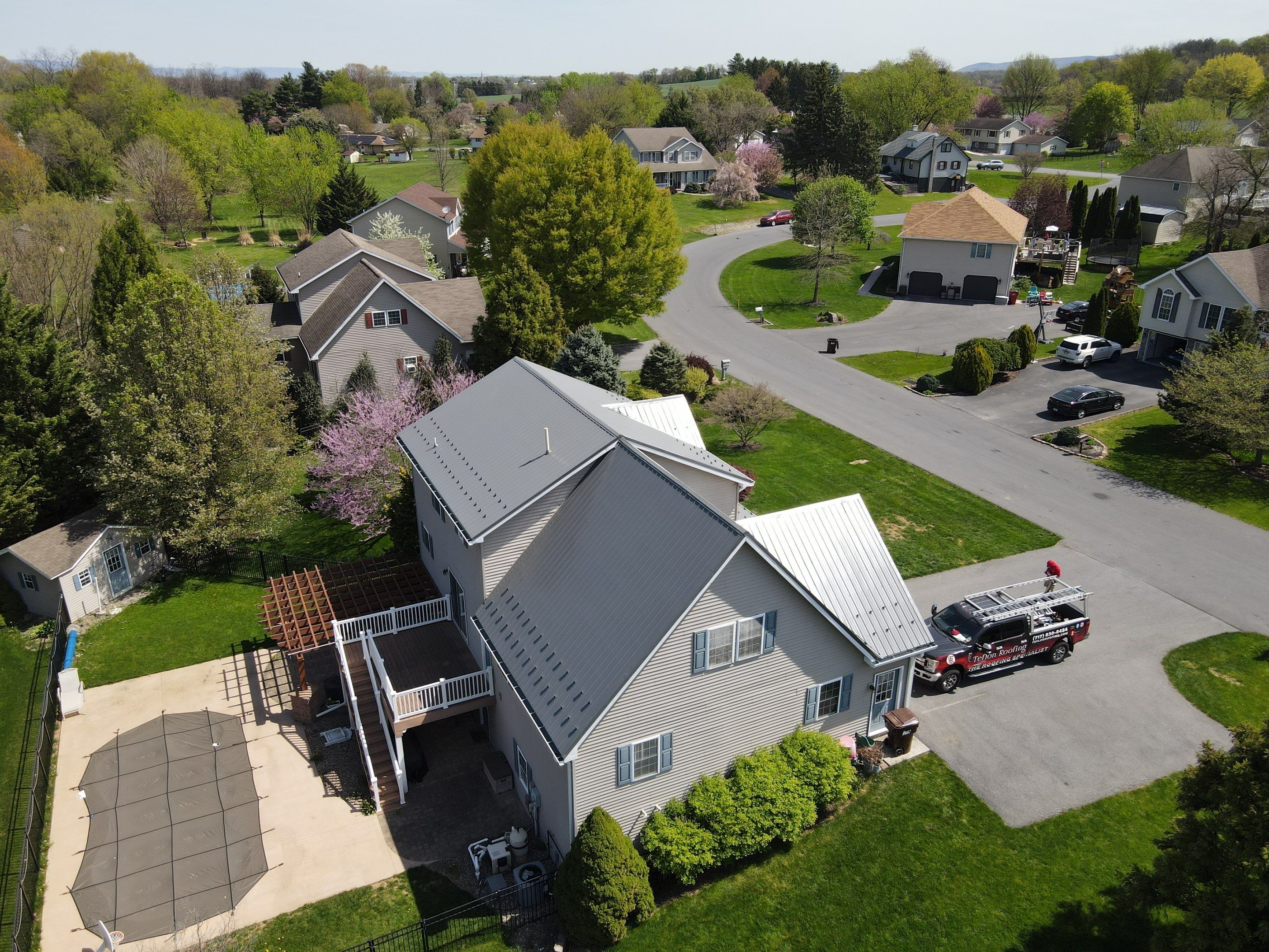 Residential Roofing Installation using Everlast Azm Panel -charcoal by Teflon Roofing