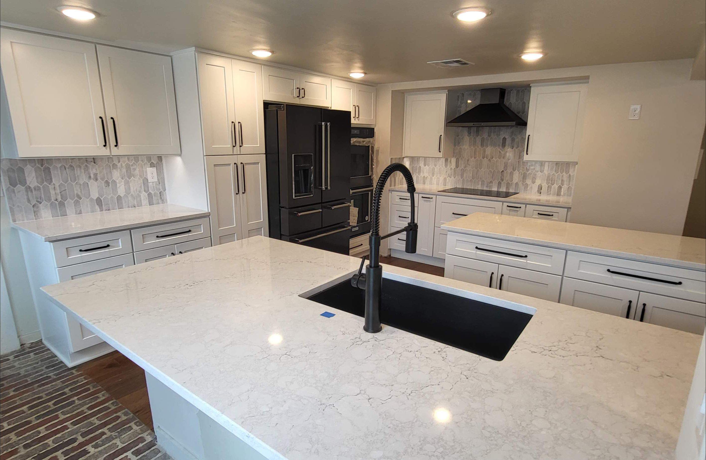 Boerne Kitchen Remodel with Quartz Countertops and White Shaker Cabinets by Legacy Bath and Kitchen