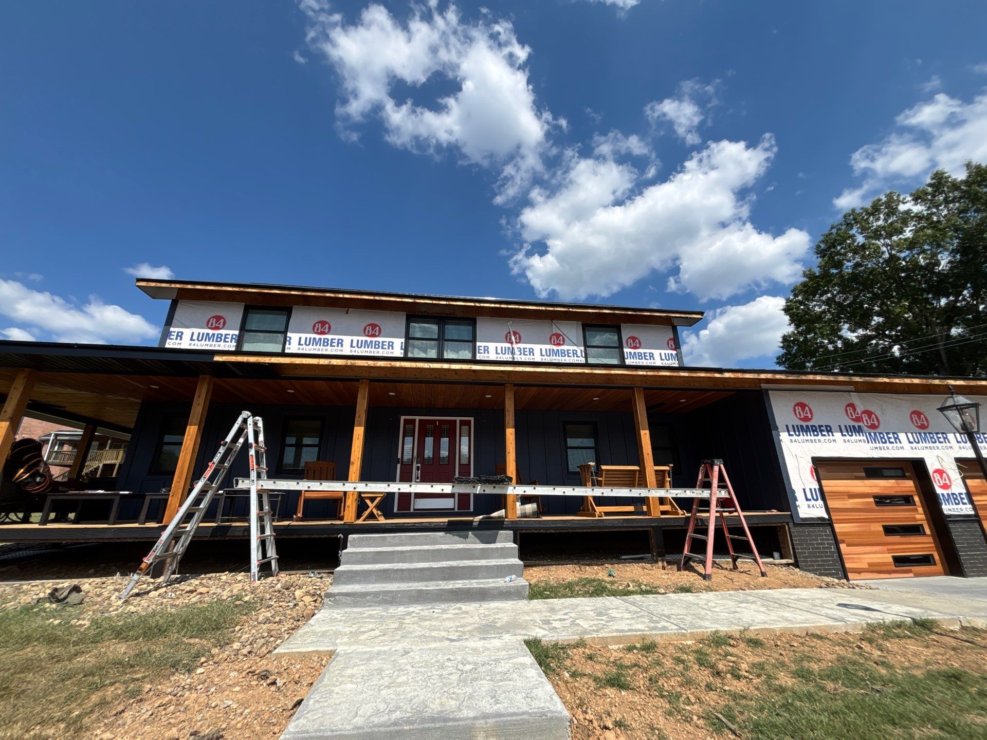 Siding and Metal Roof by Fahey Roofing + Contracting