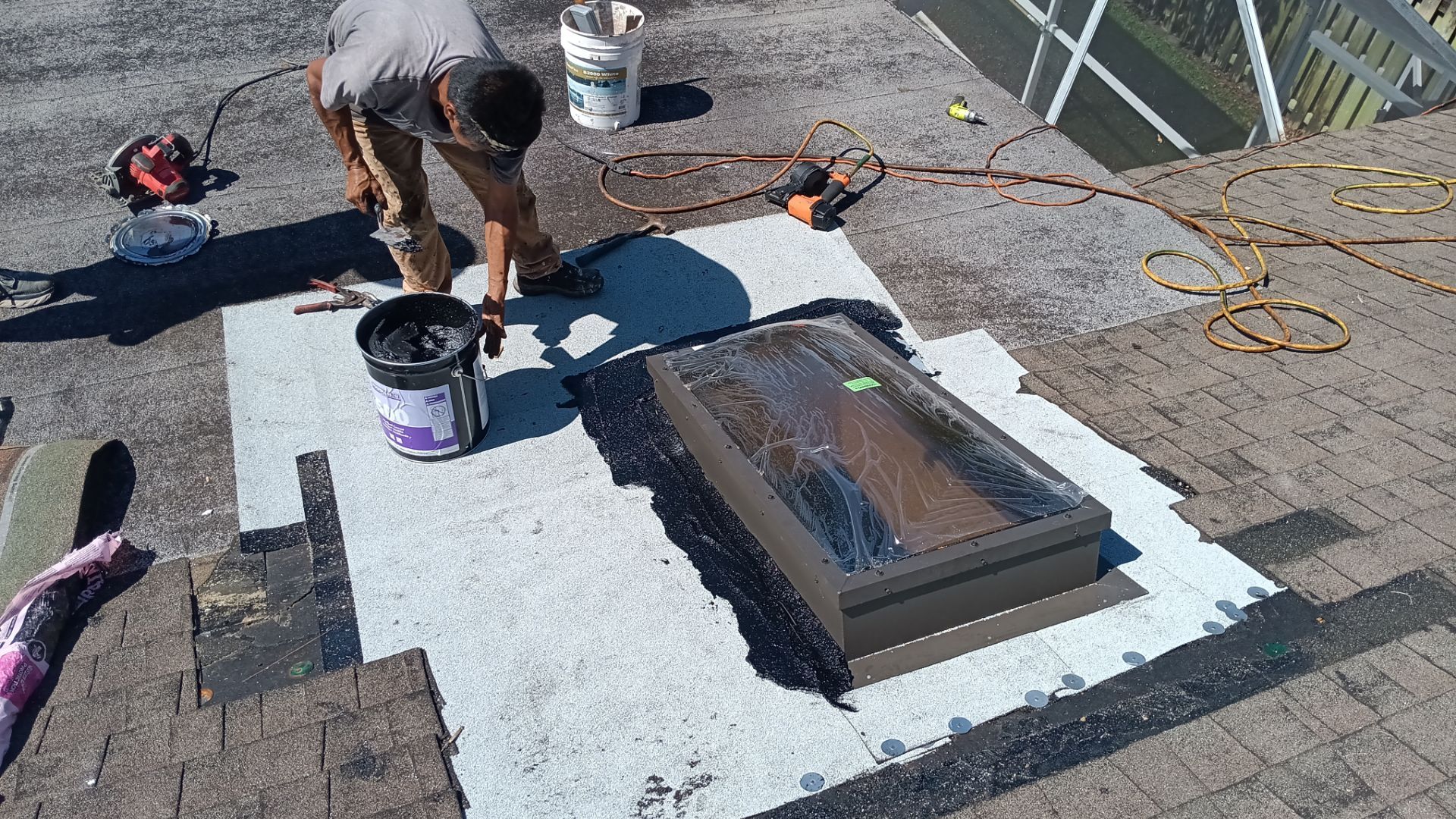 REPLACE NON APPROVED SKYLIGHT ALONG WITH CLOGED GUTTER by Morton Roofing, Inc.