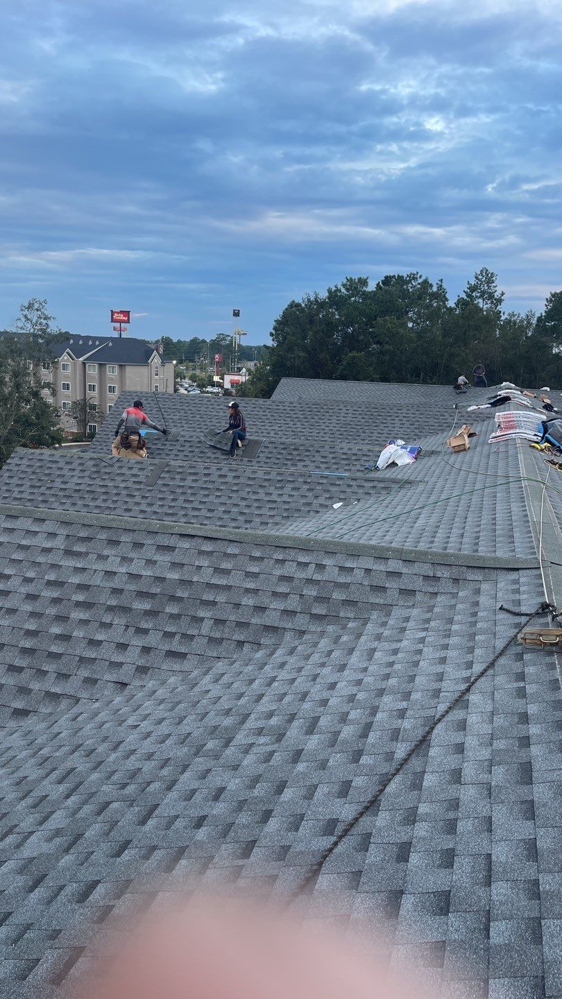 Commercial Roofing Installation using Roof Replacement by American Roofing & Construction LLC