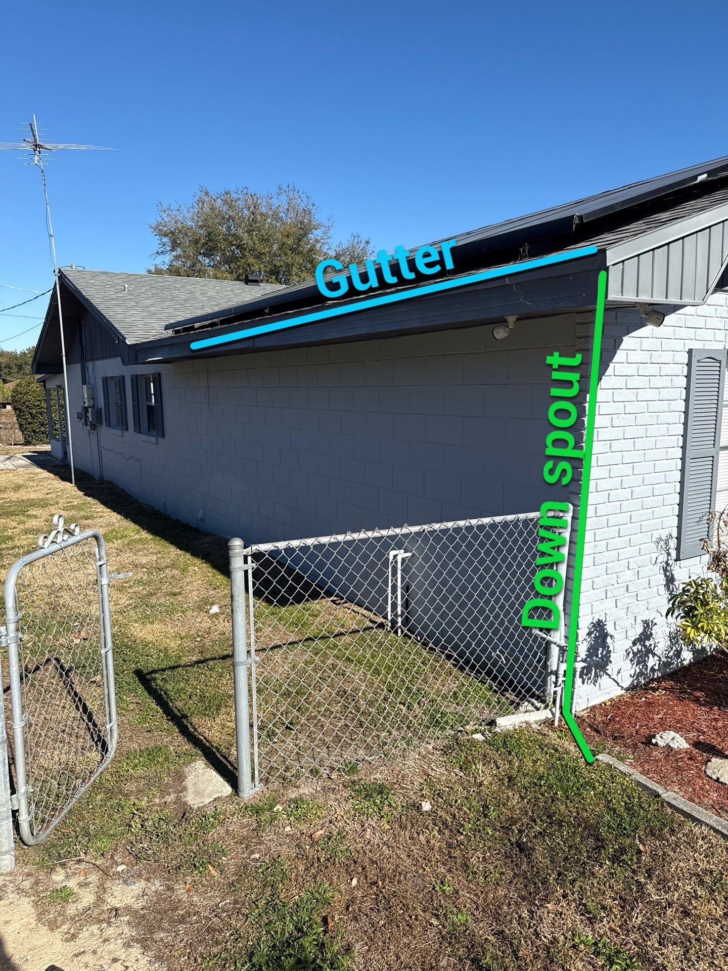 Downspout Installation using Downspout Extension and new Gutters in Winter Haven FL by Gutter Professors