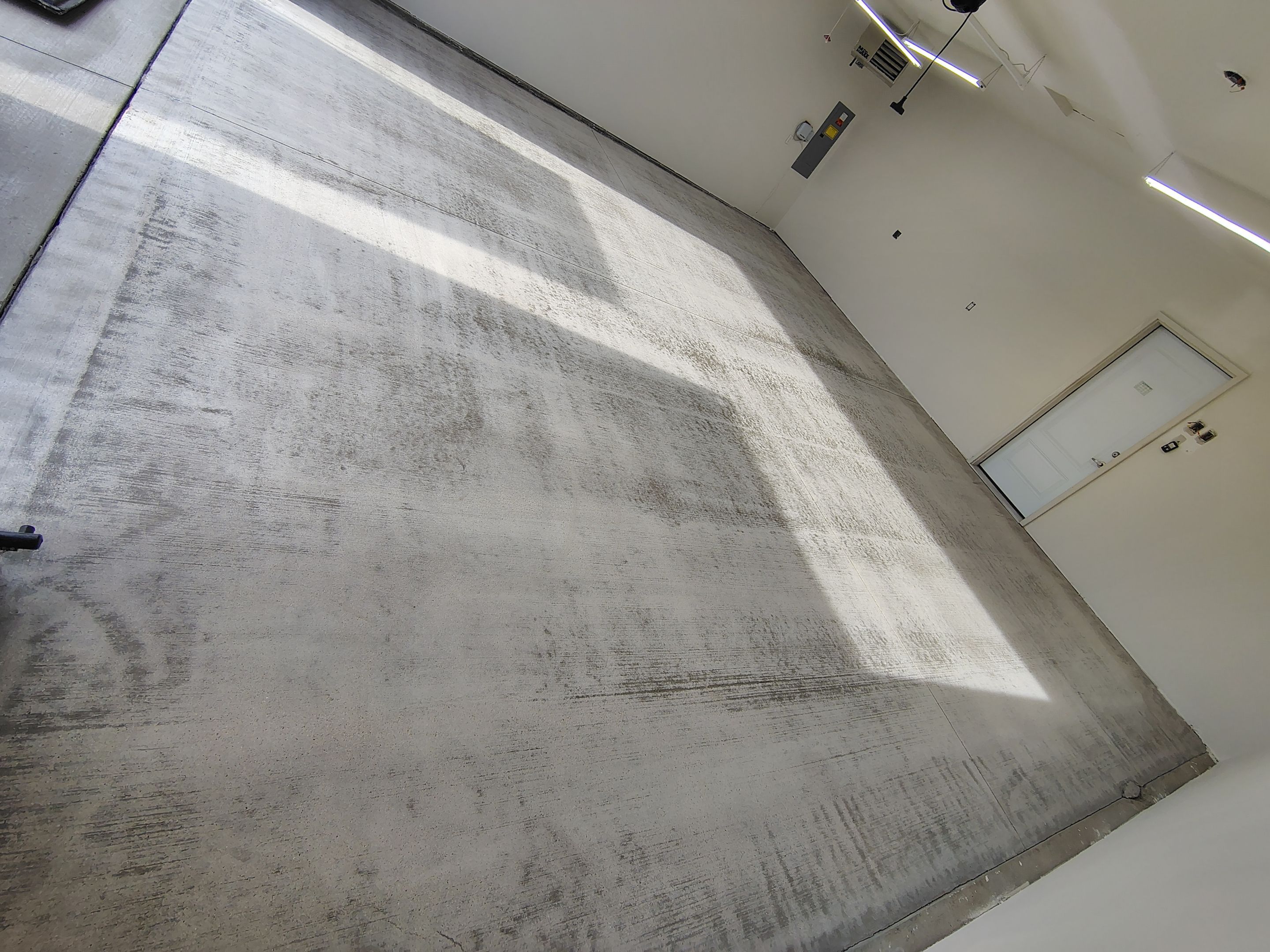 Garage Floor Coating with Coyote Decorative Chip in Tea by Select Painting, Coatings & Garage Cabinets