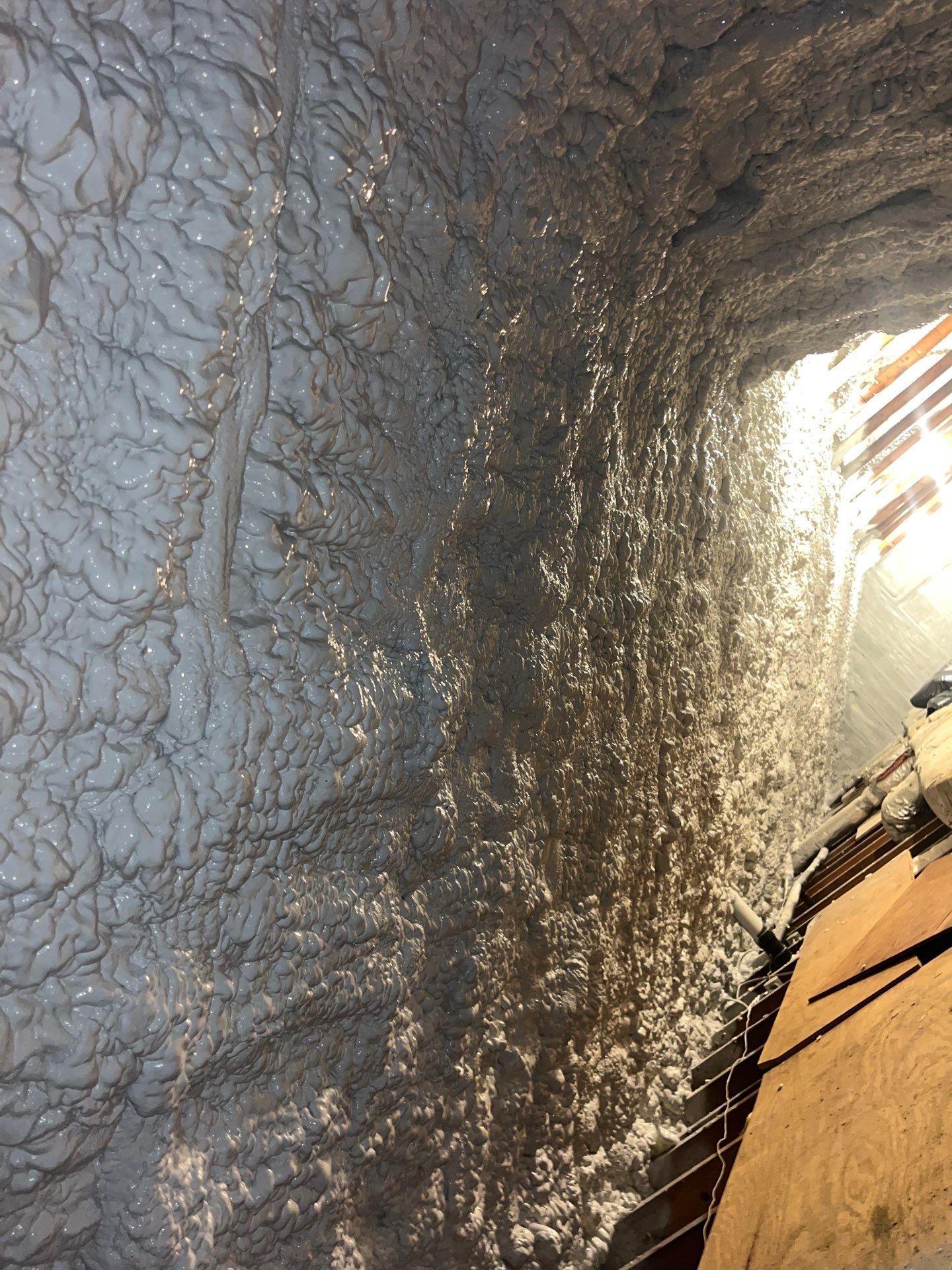 Attic Retrofit using open cell spray foam by NYS Foam & Energy