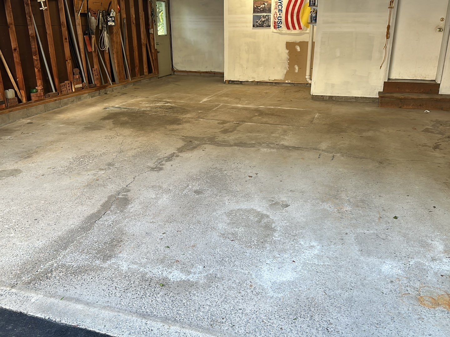 Silverado garage floor coating  by NG Masonry & Construction LLC