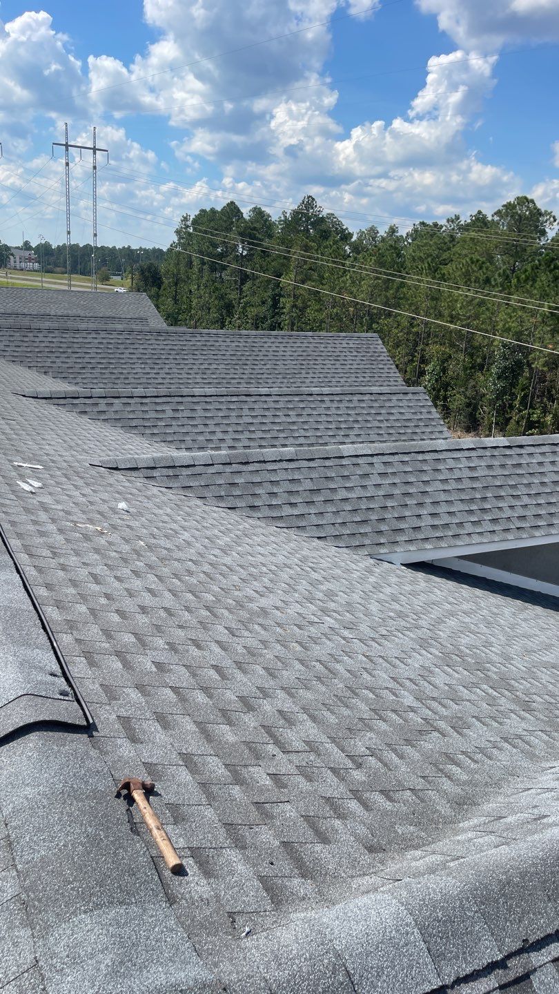 Commercial Roofing Installation using Roof Replacement by American Roofing & Construction LLC