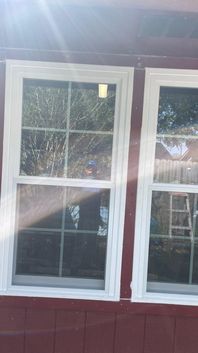 Black and white and red all over by Bayfront Roofing and Construction
