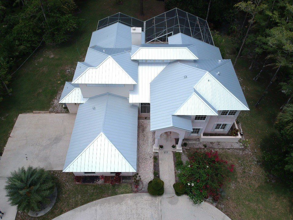 Residential Roofing Installation using 1" Nail strip metal roof by BLUES BROTHERS CONSTRUCTION CORP