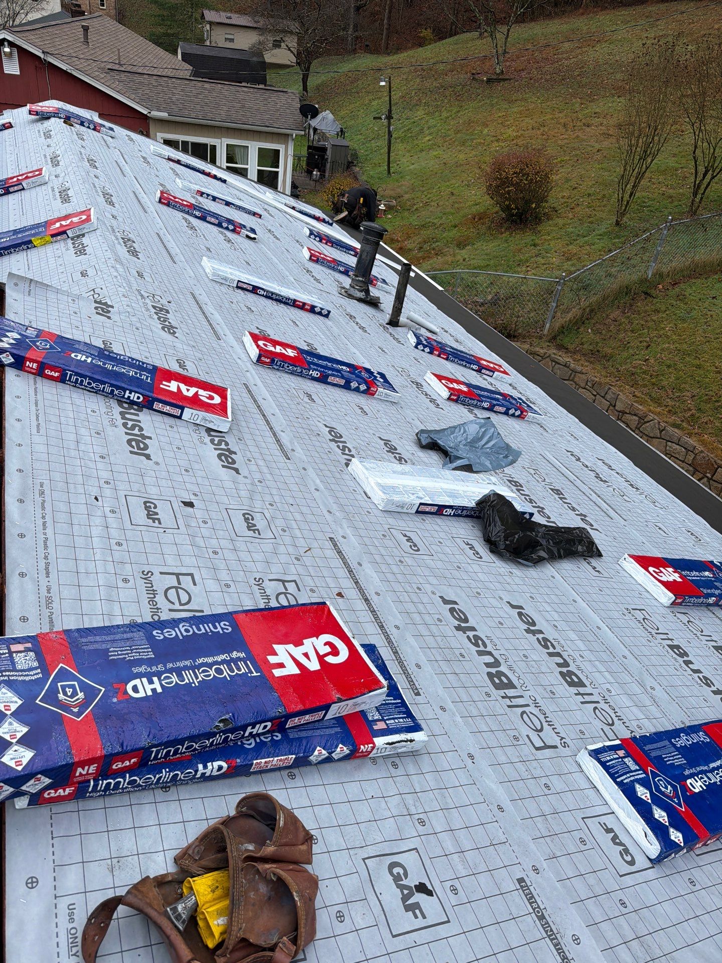 Residential Roofing Installation using GAF Timberline HDZ Charcoal by Rainstoppers Roofing