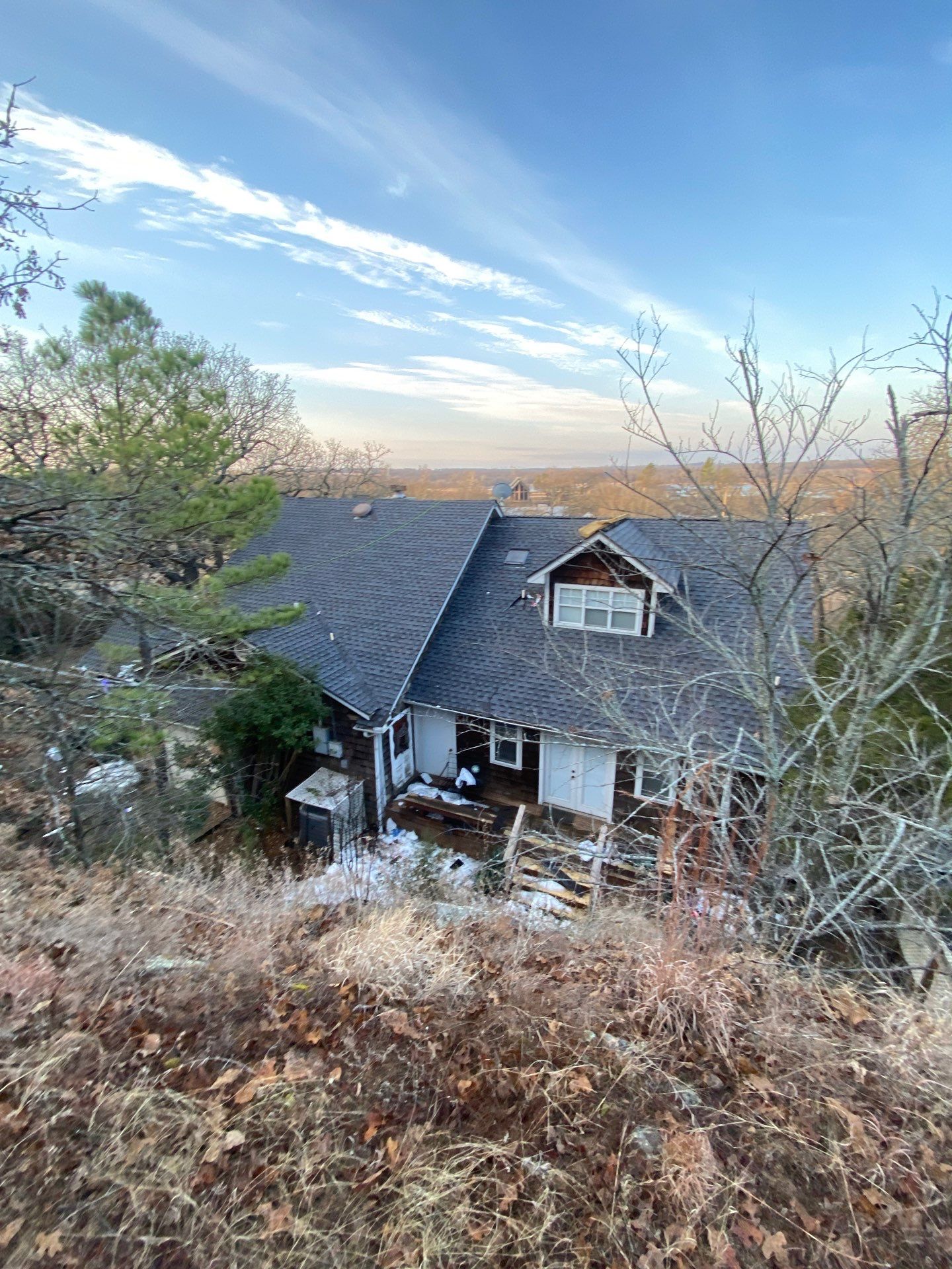 Roof Replacement on a private lake near Ardmore by BANA Roofing and Solar Supply