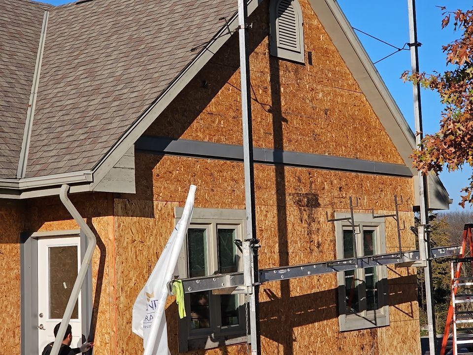 Siding Installation using Norandex Polar Wall Plus Siding, Window Wraps by Total Exteriors