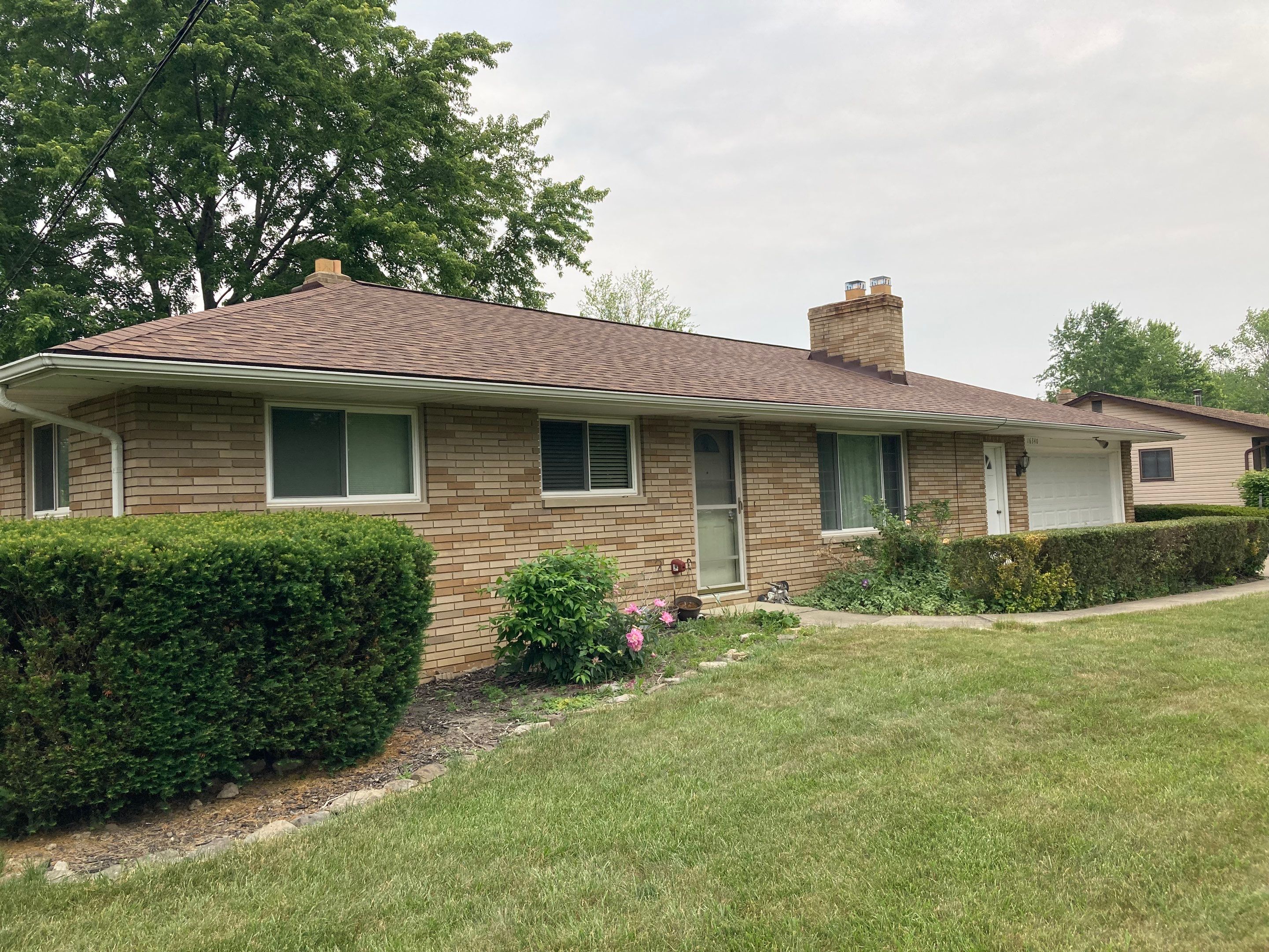 Residential Roof Replacement using Owens Corning, Desert Rose by Absolute Roofing and Construction