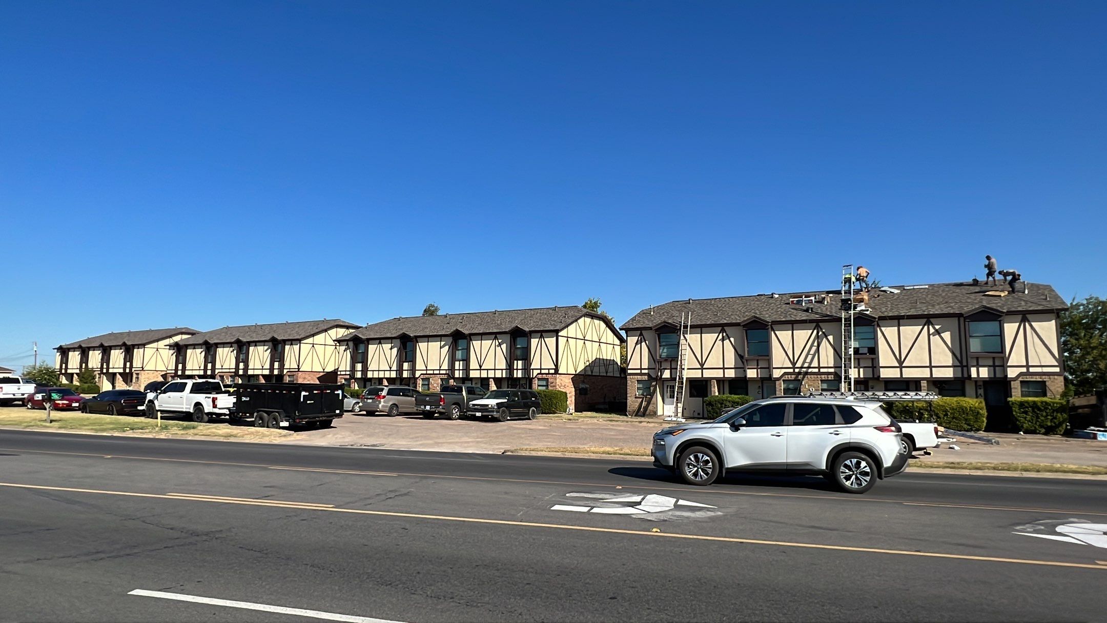Commercial Roofing Installation using ATLAS Pinnacle Pristine Shingles by Harvey Roofing & Construction